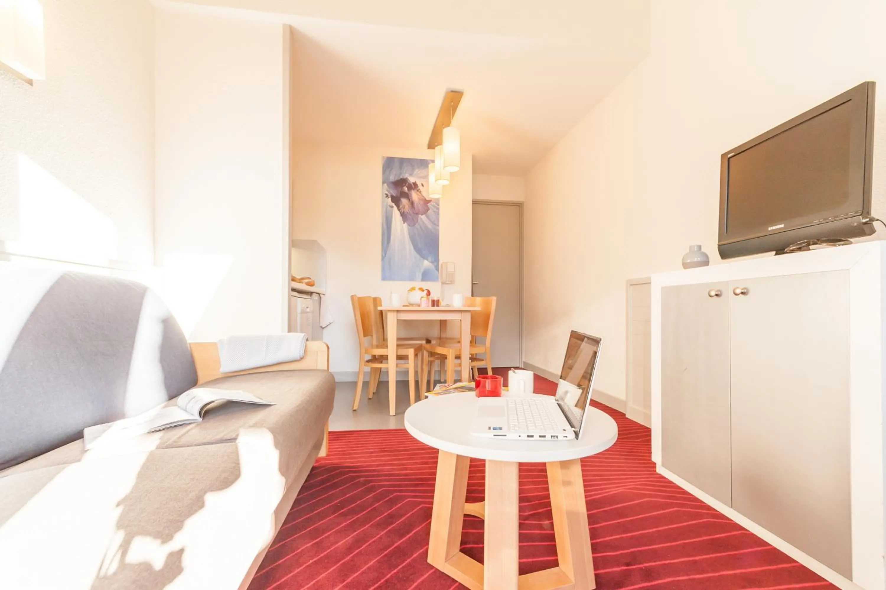 Communal lounge/ TV room in Résidence Pierre & Vacances La Daille