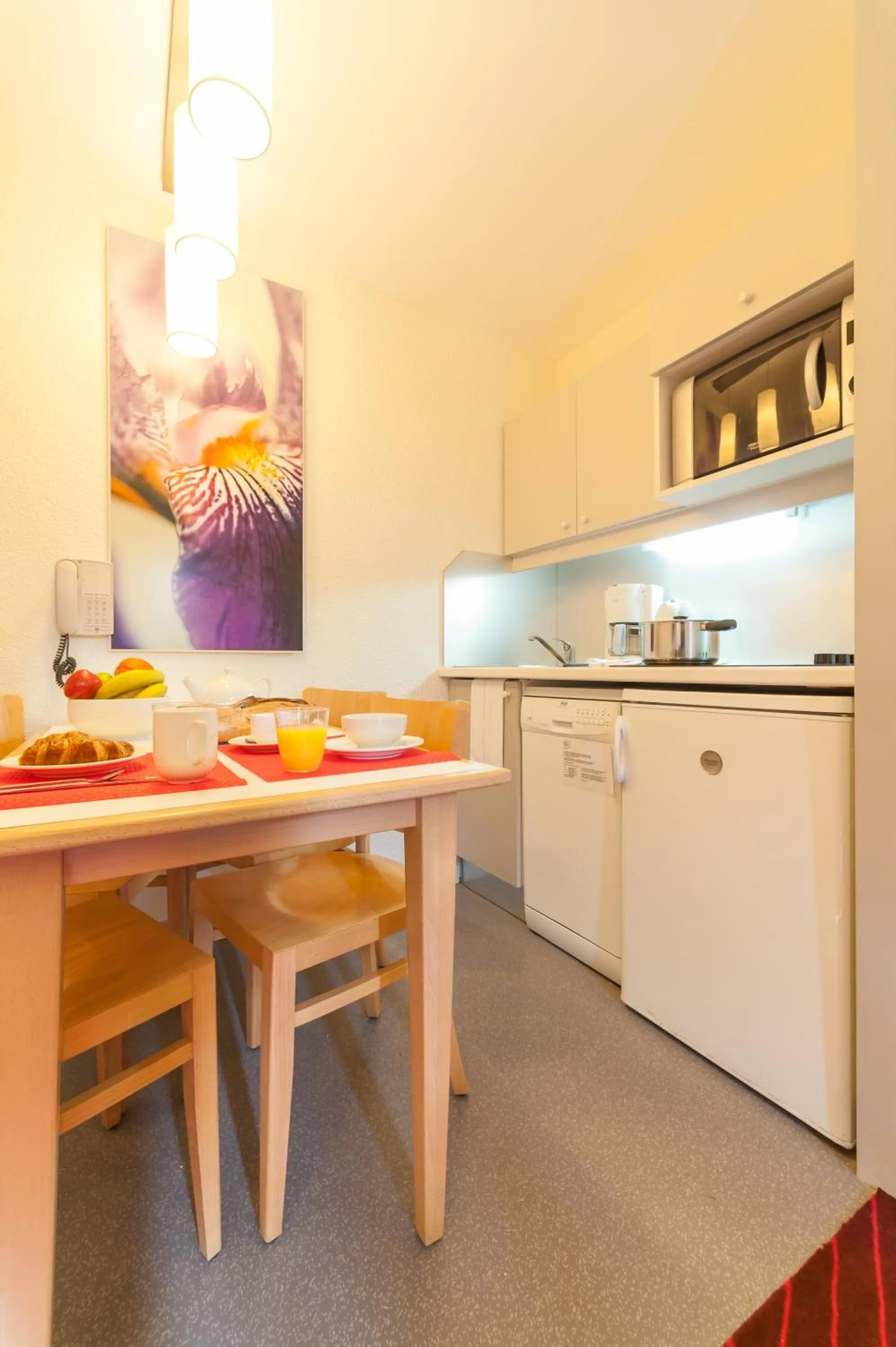 Kitchen or kitchenette in Résidence Pierre & Vacances La Daille