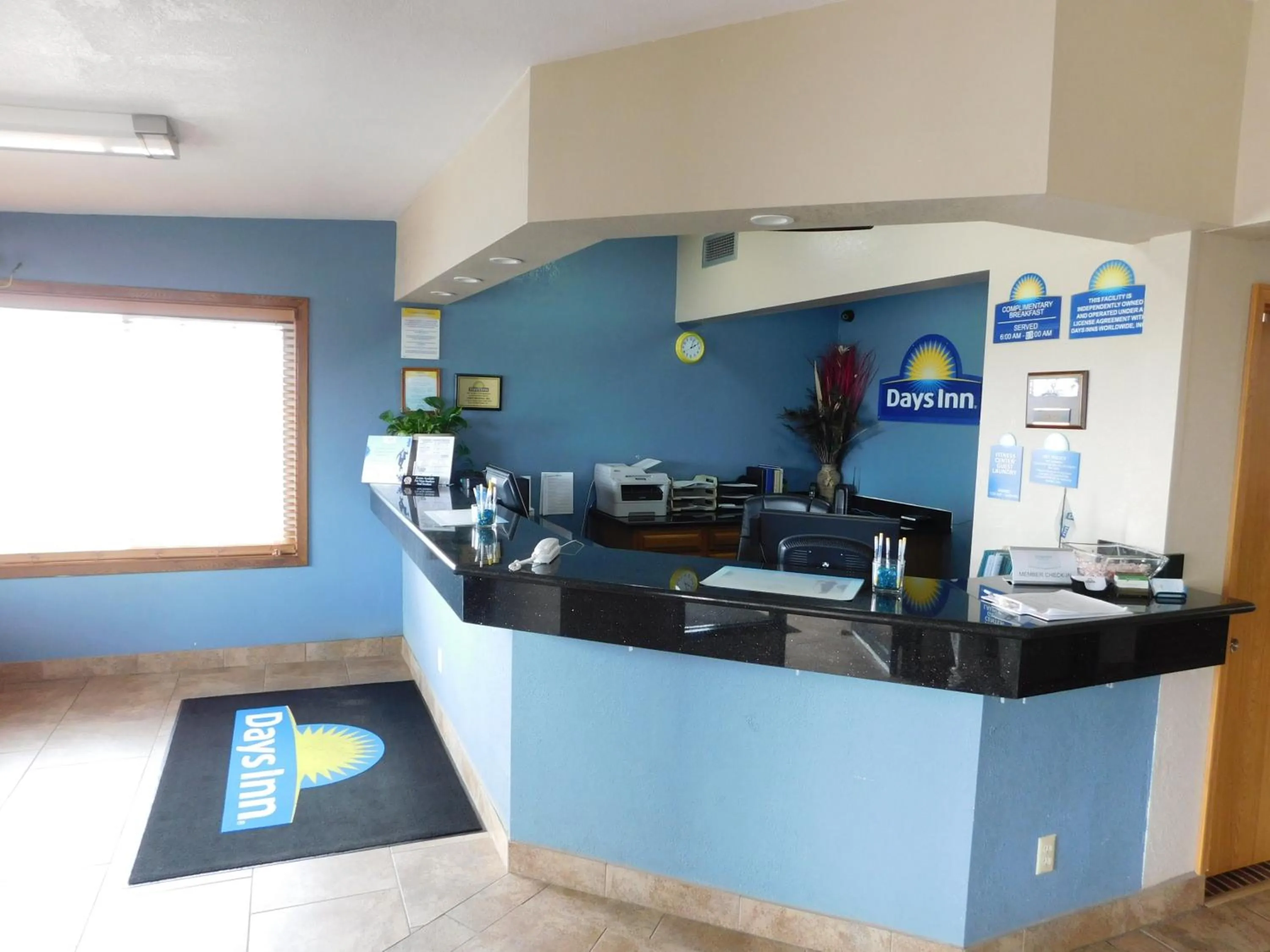 Property logo or sign in Days Inn by Wyndham Newton