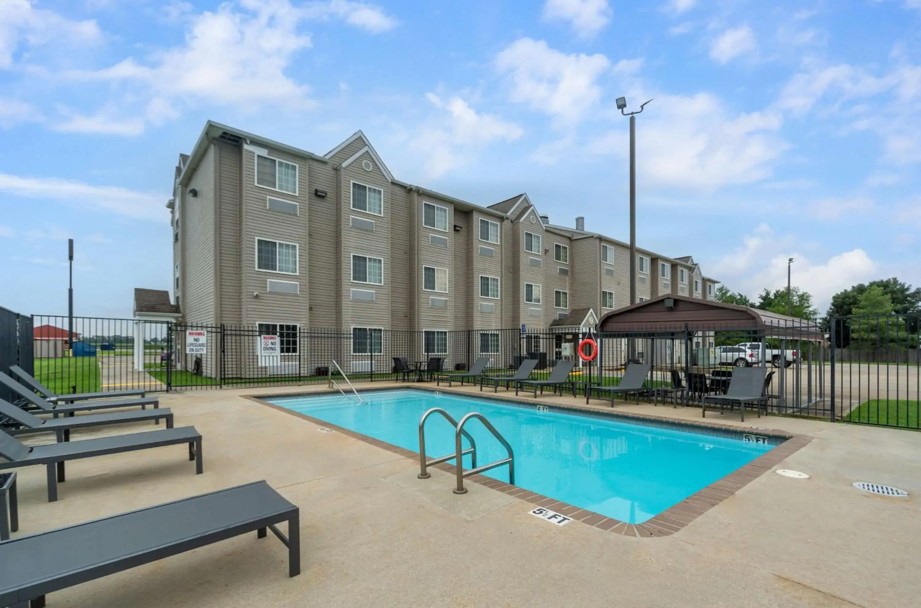 Pool view in Microtel Inn & Suites by Wyndham Breaux Bridge Pool view in Microtel Inn & Suites by Wyndham Breaux Bridge