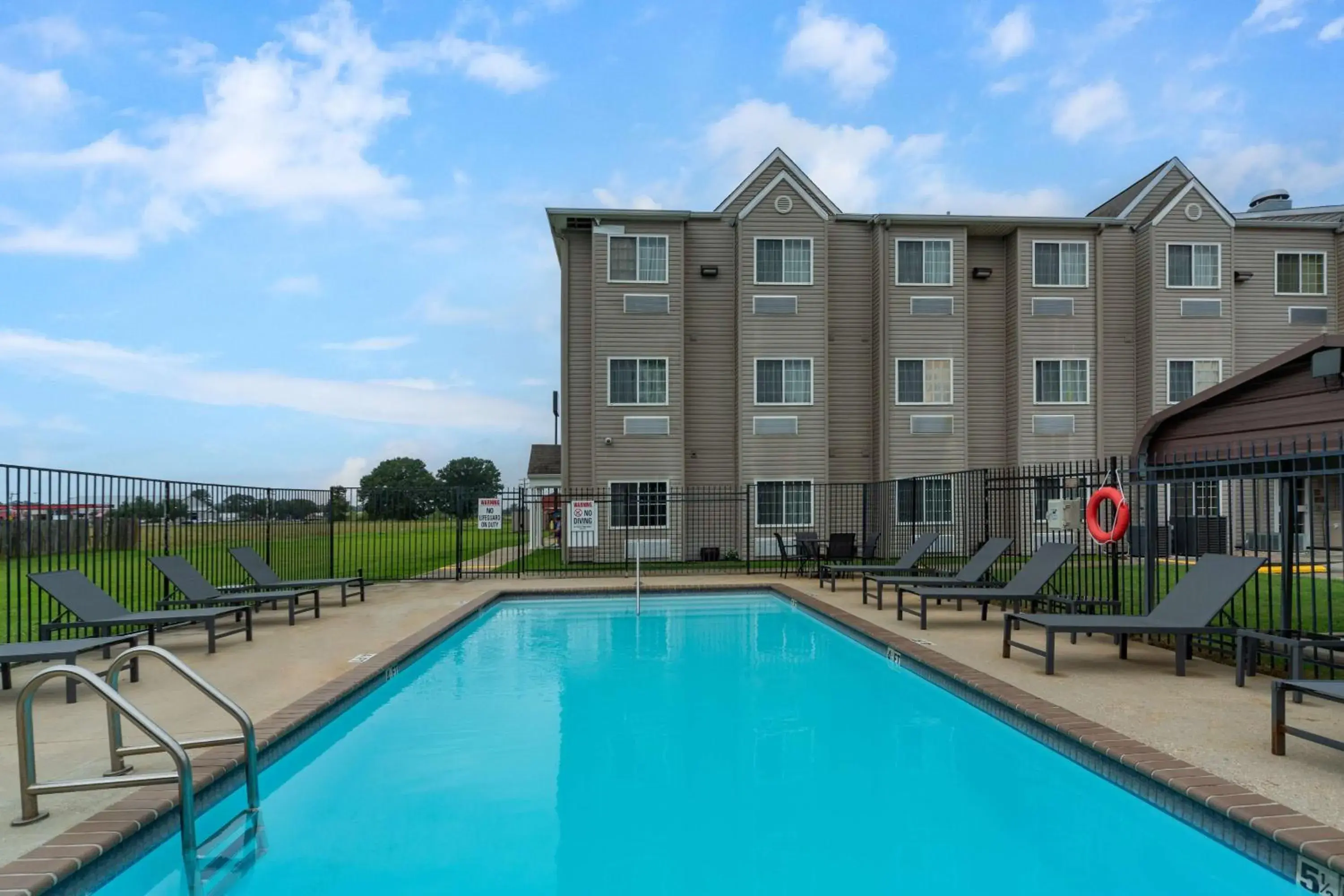 Pool view in Microtel Inn & Suites by Wyndham Breaux Bridge Pool view in Microtel Inn & Suites by Wyndham Breaux Bridge