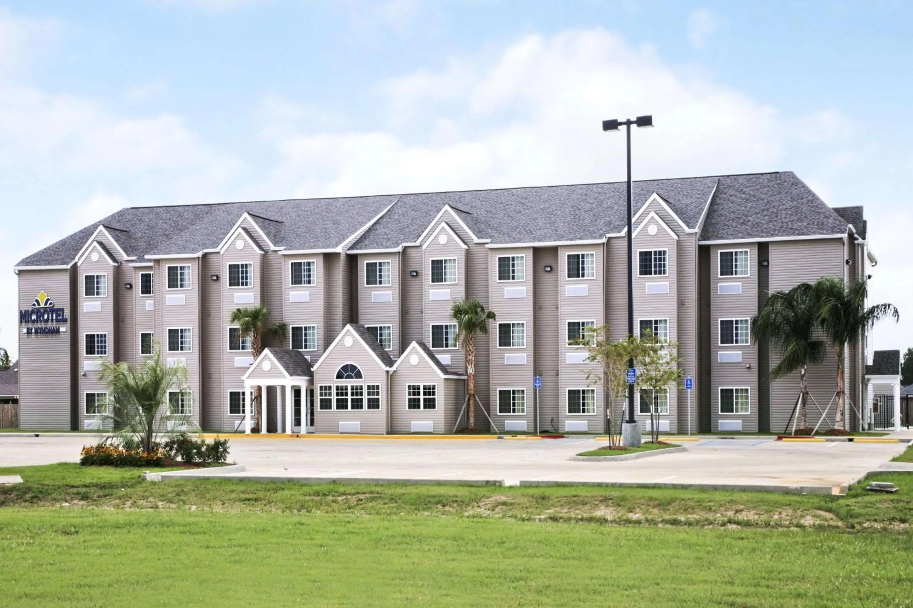 Property building in Microtel Inn & Suites by Wyndham Breaux Bridge