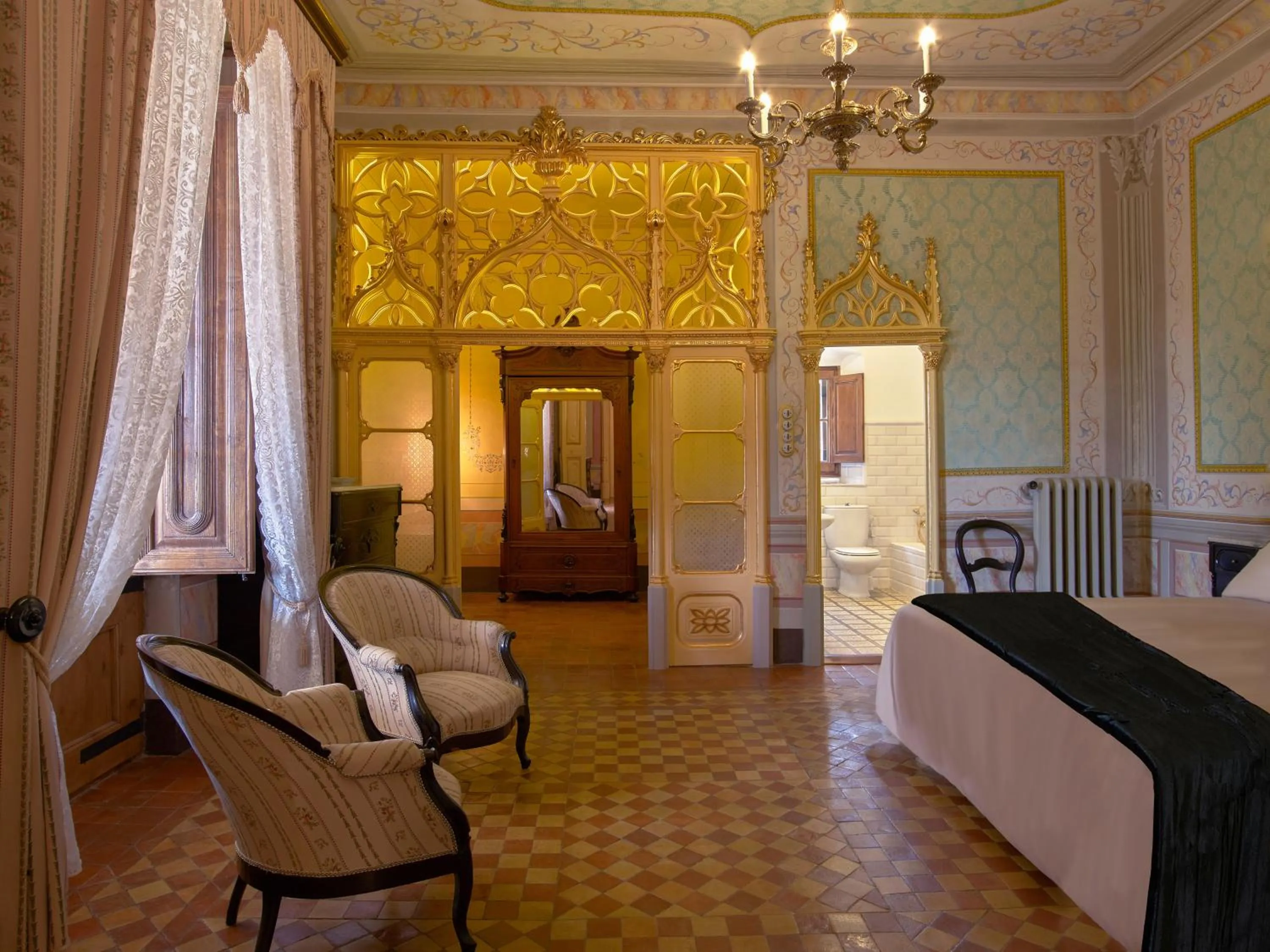 Seating area, Bed in Mas El Ricart