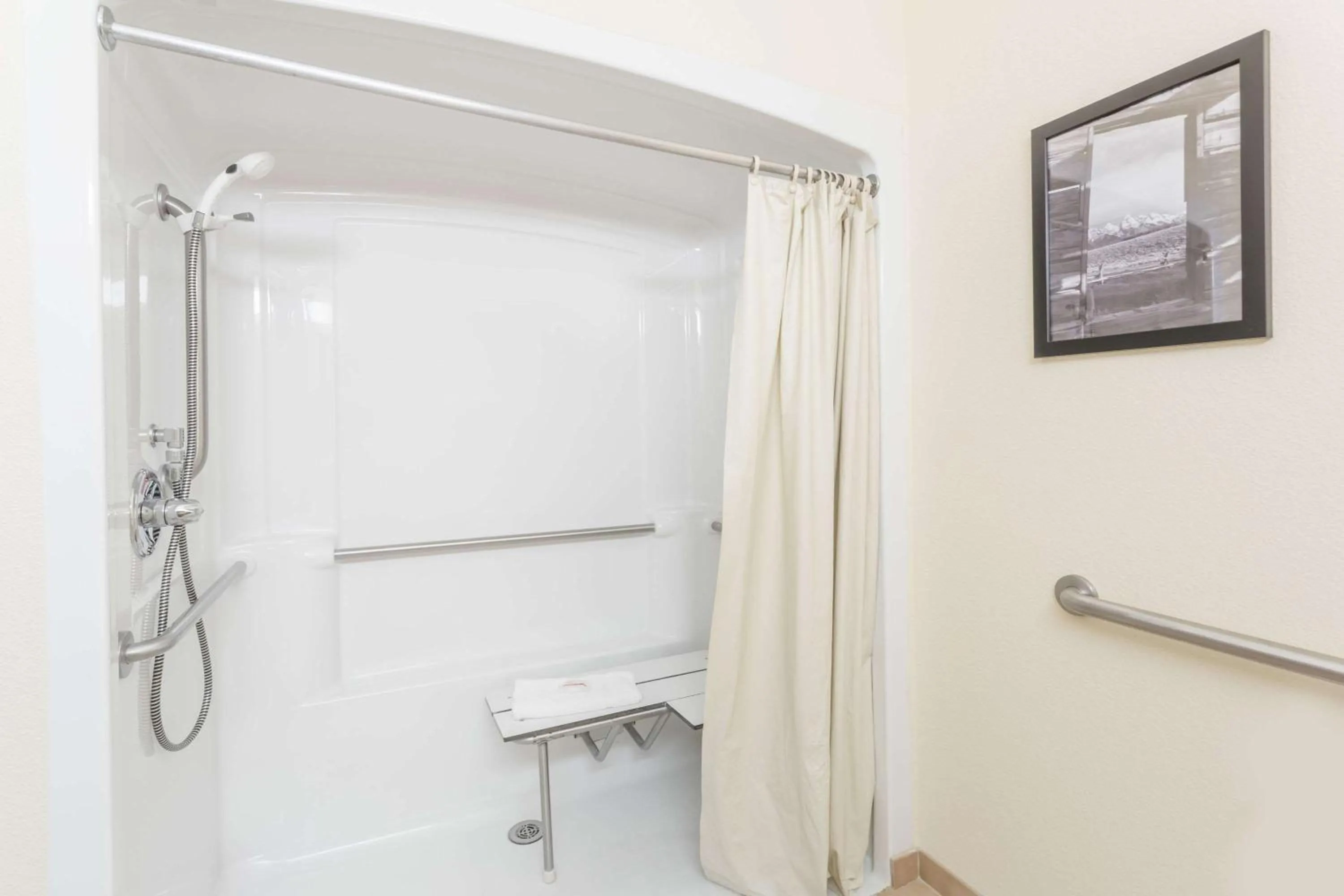 Bathroom in Super 8 by Wyndham Wheatland Wyoming