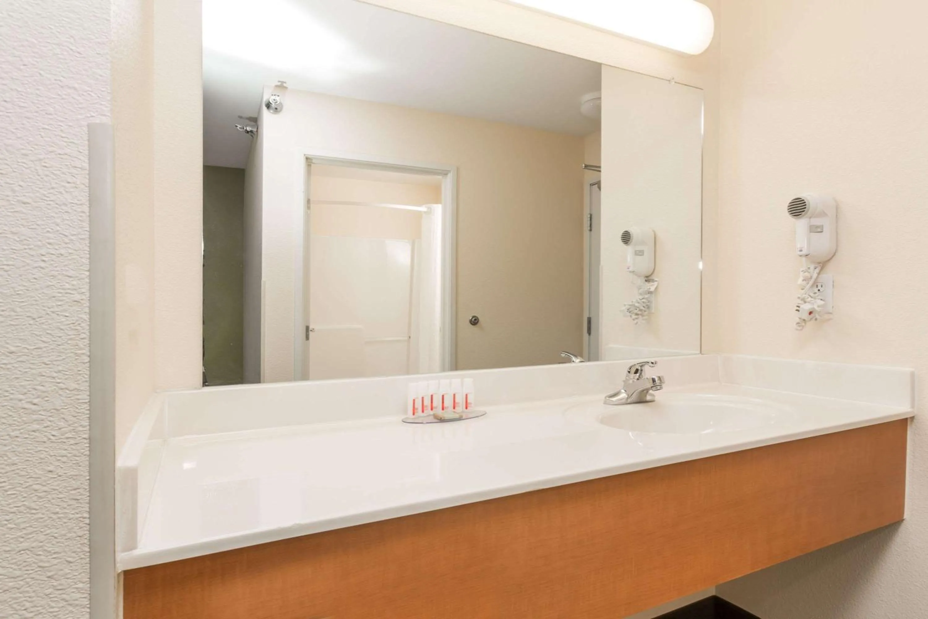 Bathroom in Super 8 by Wyndham Wheatland Wyoming