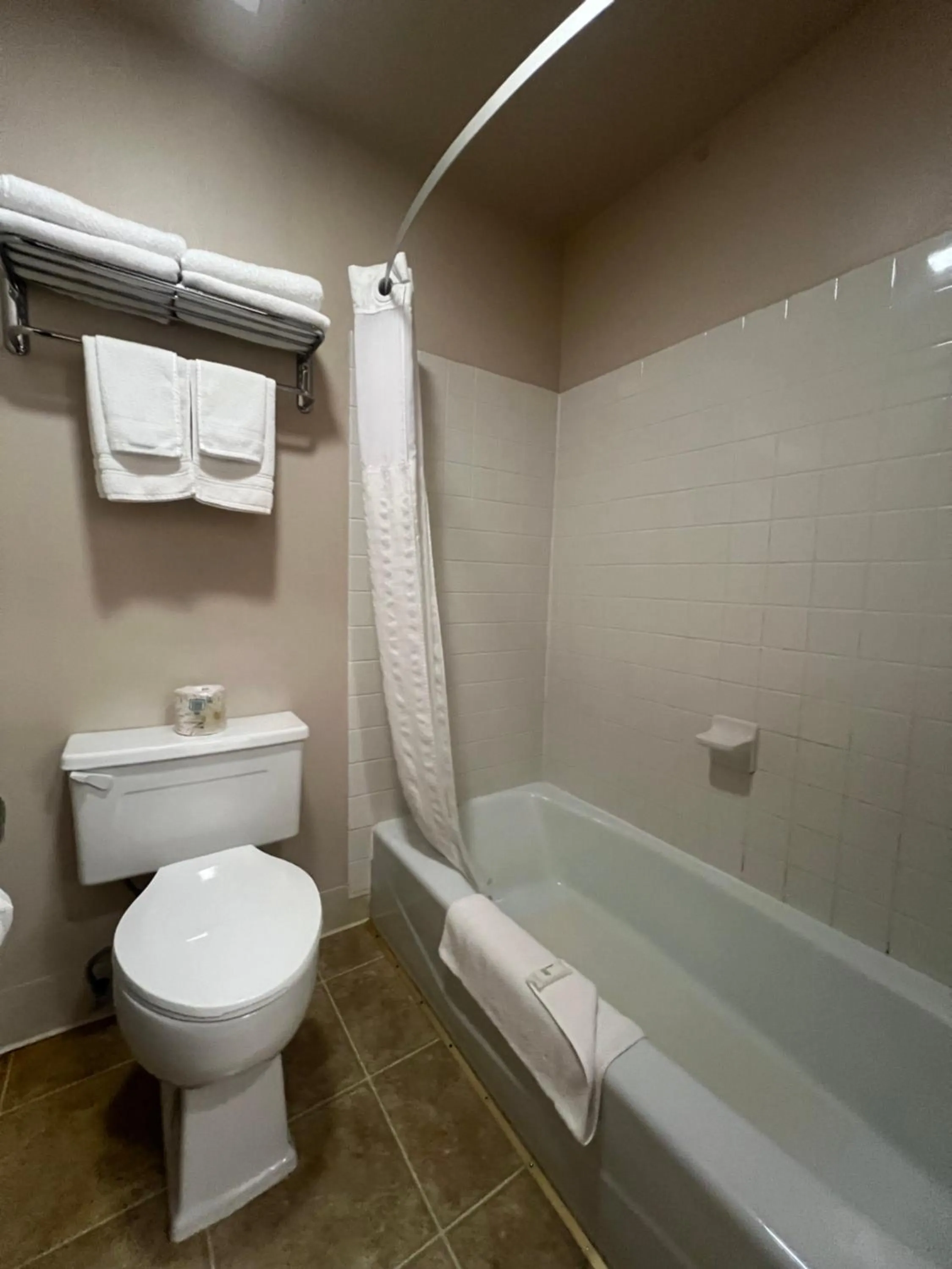 Toilet in Super 8 by Wyndham Sturgis