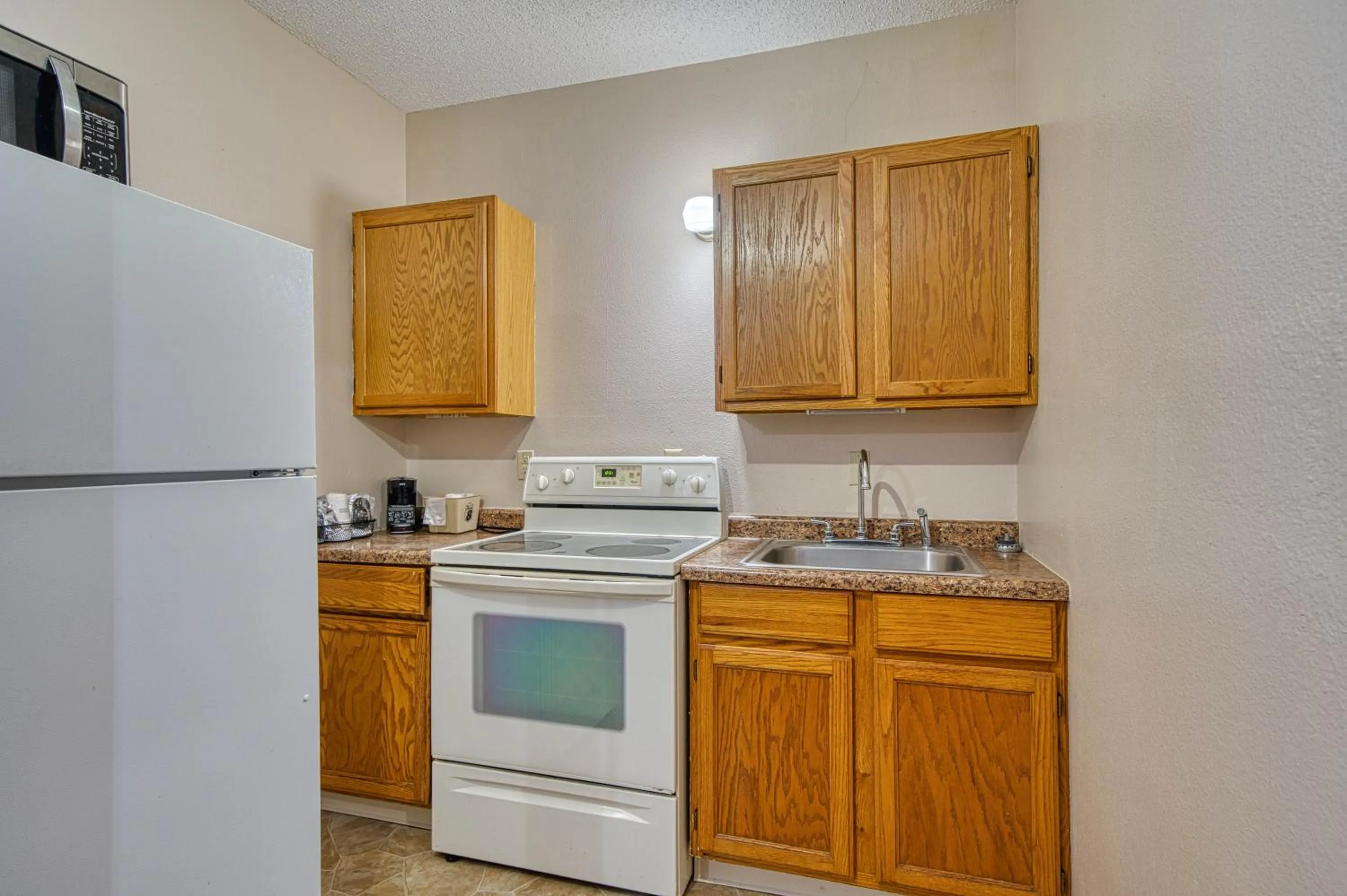 Kitchen or kitchenette in Super 8 by Wyndham Sturgis