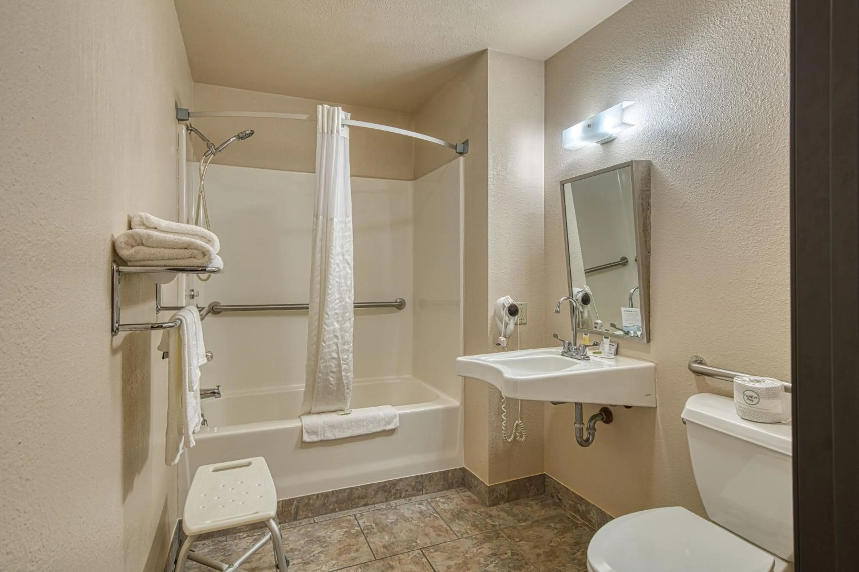 Toilet in Super 8 by Wyndham Sturgis