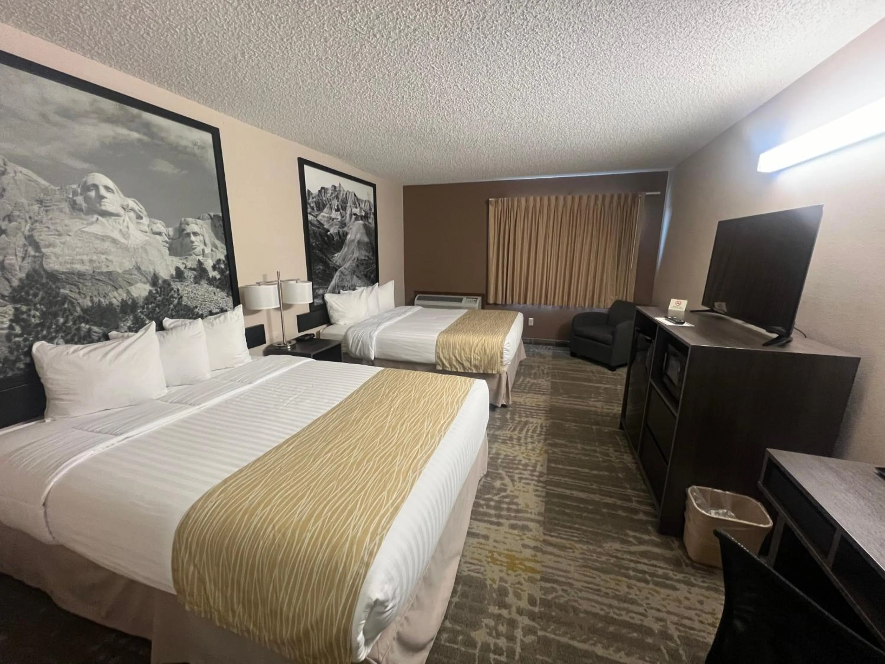 Bed in Super 8 by Wyndham Sturgis