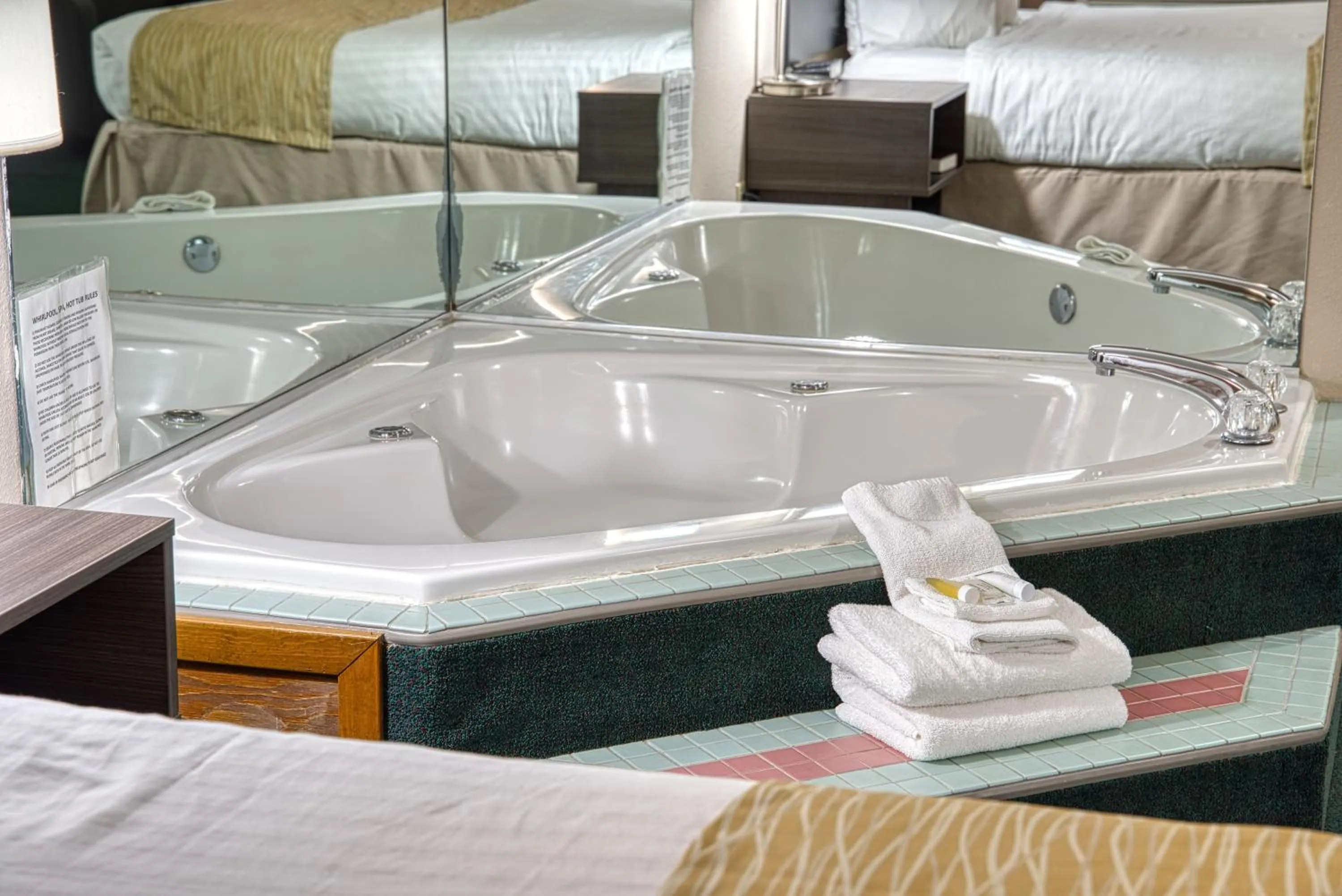 Bed in Super 8 by Wyndham Sturgis