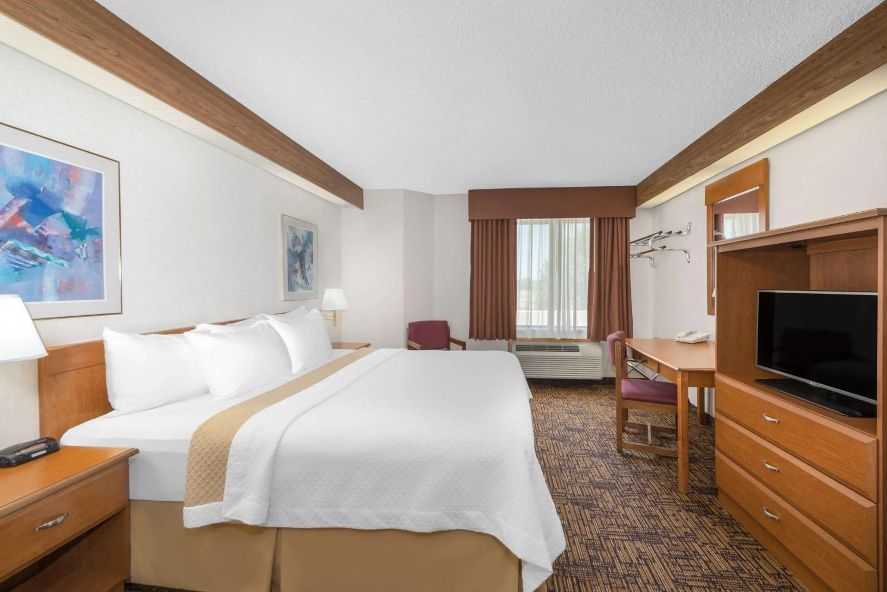 Photo of the whole room, Bed in Days Inn by Wyndham Liberal KS