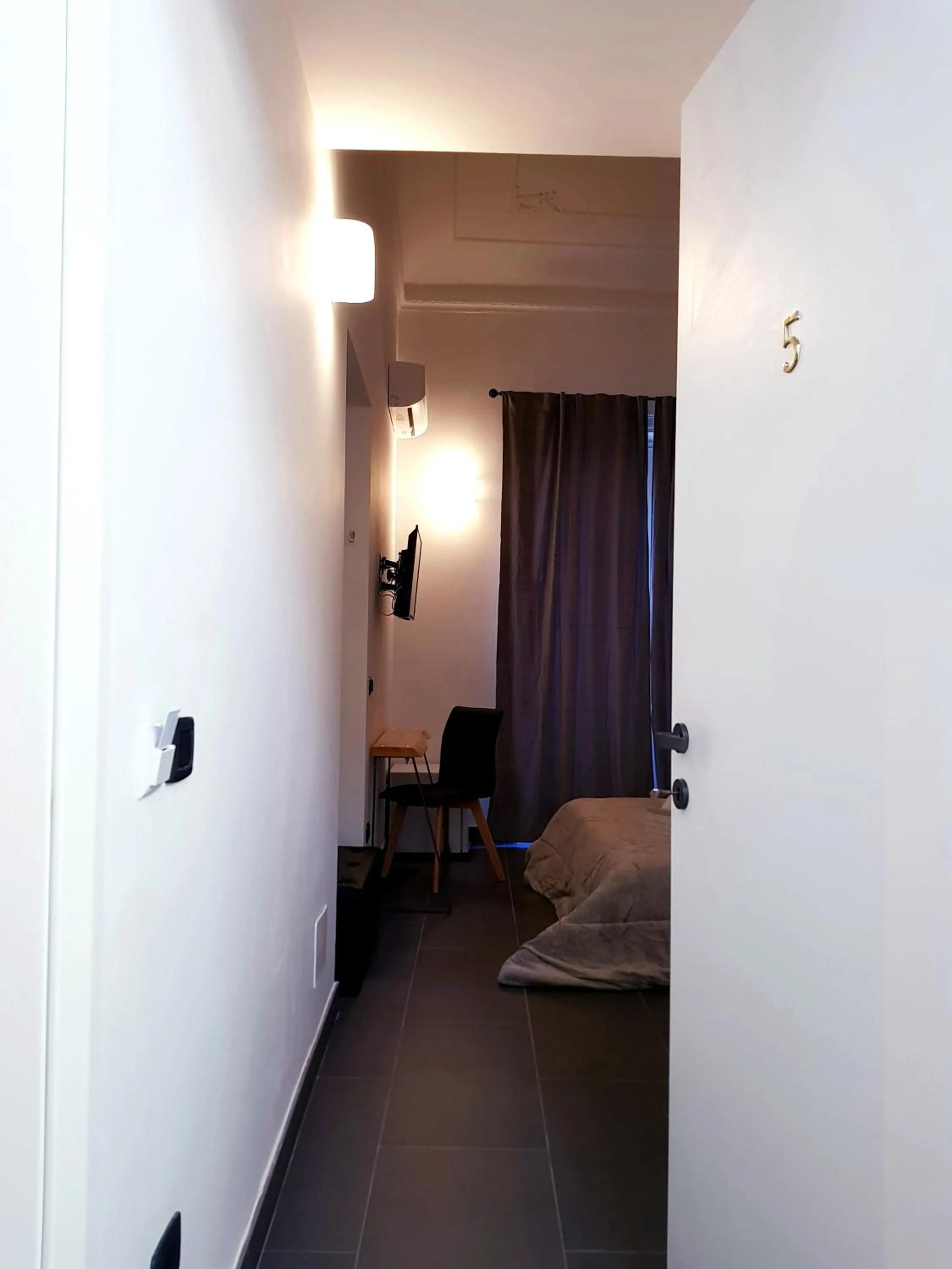 Living room, Bed in Pupi 93 Rooms