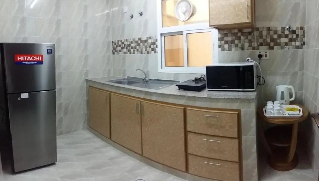 Kitchen or kitchenette in Season Inn Hotel