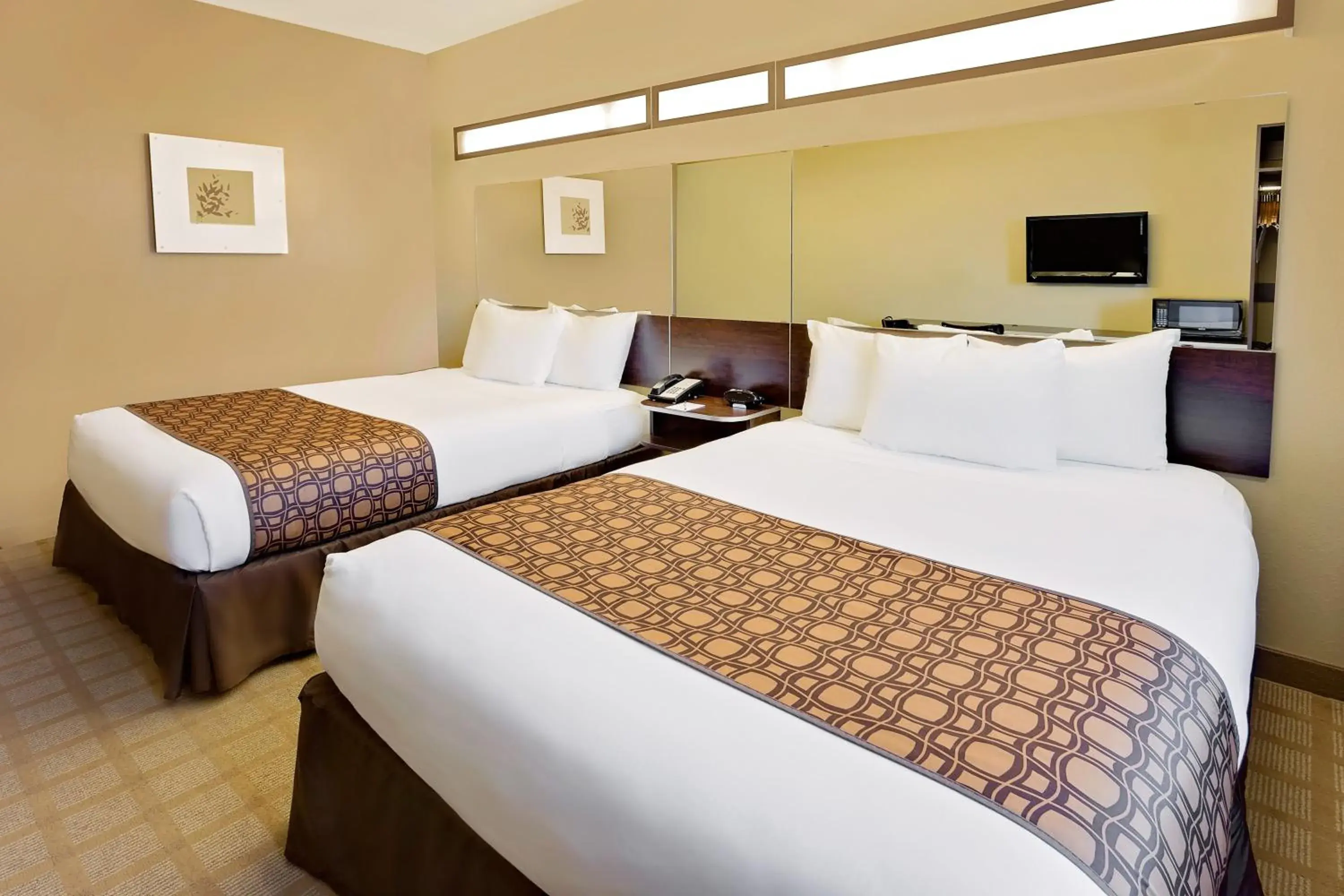 Bed in Microtel Inn & Suites by Wyndham Prairie du Chien Bed in Microtel Inn & Suites by Wyndham Prairie du Chien