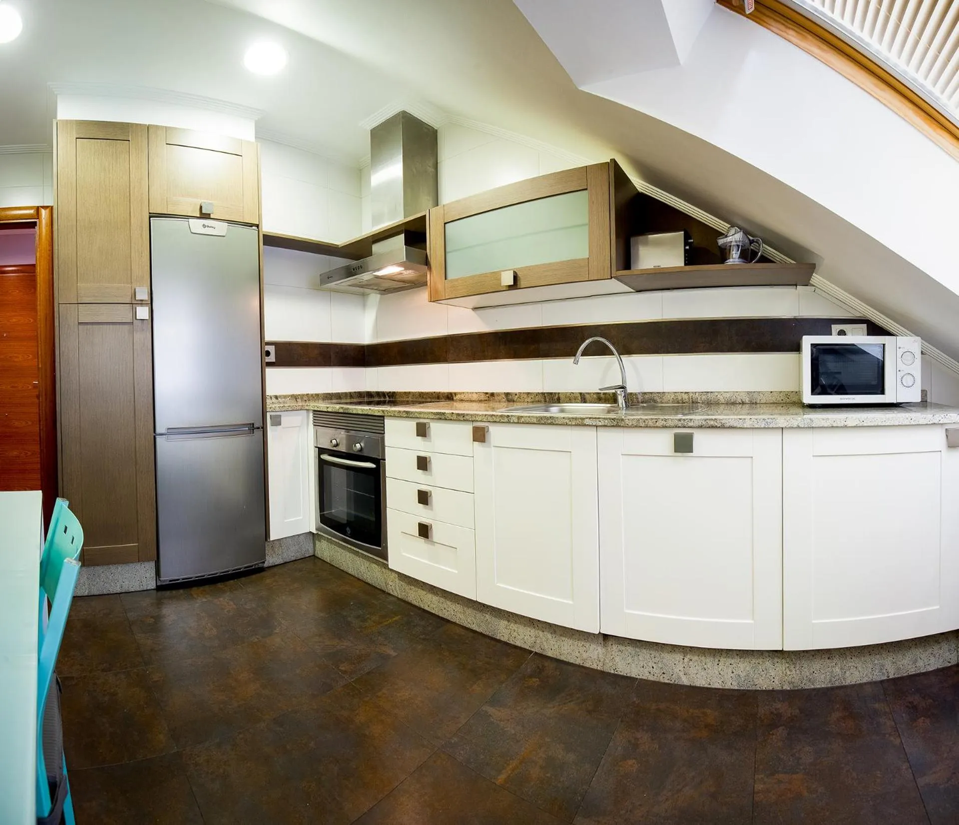Kitchen or kitchenette in Apartamentos Villa Zoila Baiona