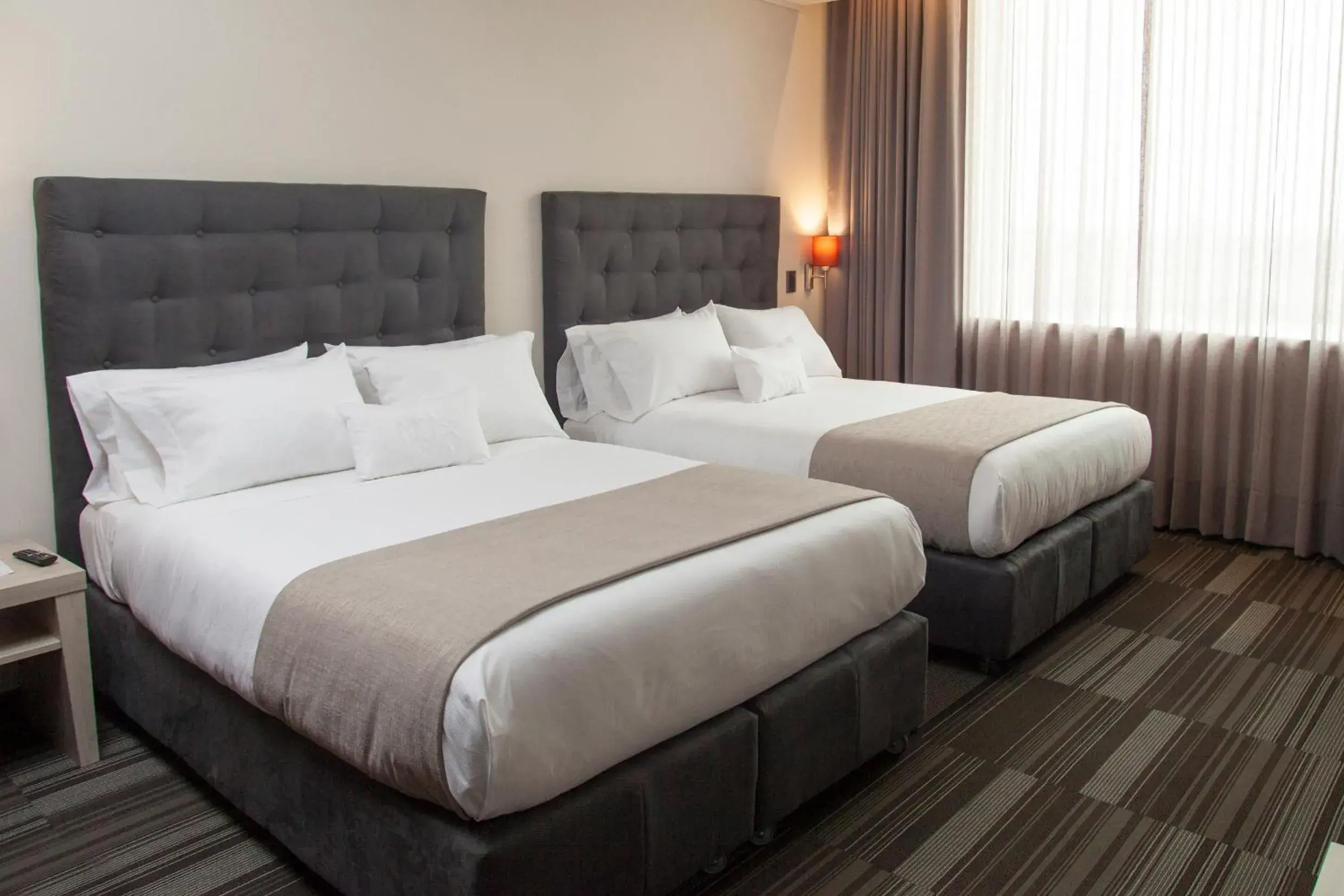 Standard Queen Room with Two Queen Beds in MDS Hotel Chillan Standard Queen Room with Two Queen Beds in MDS Hotel Chillan