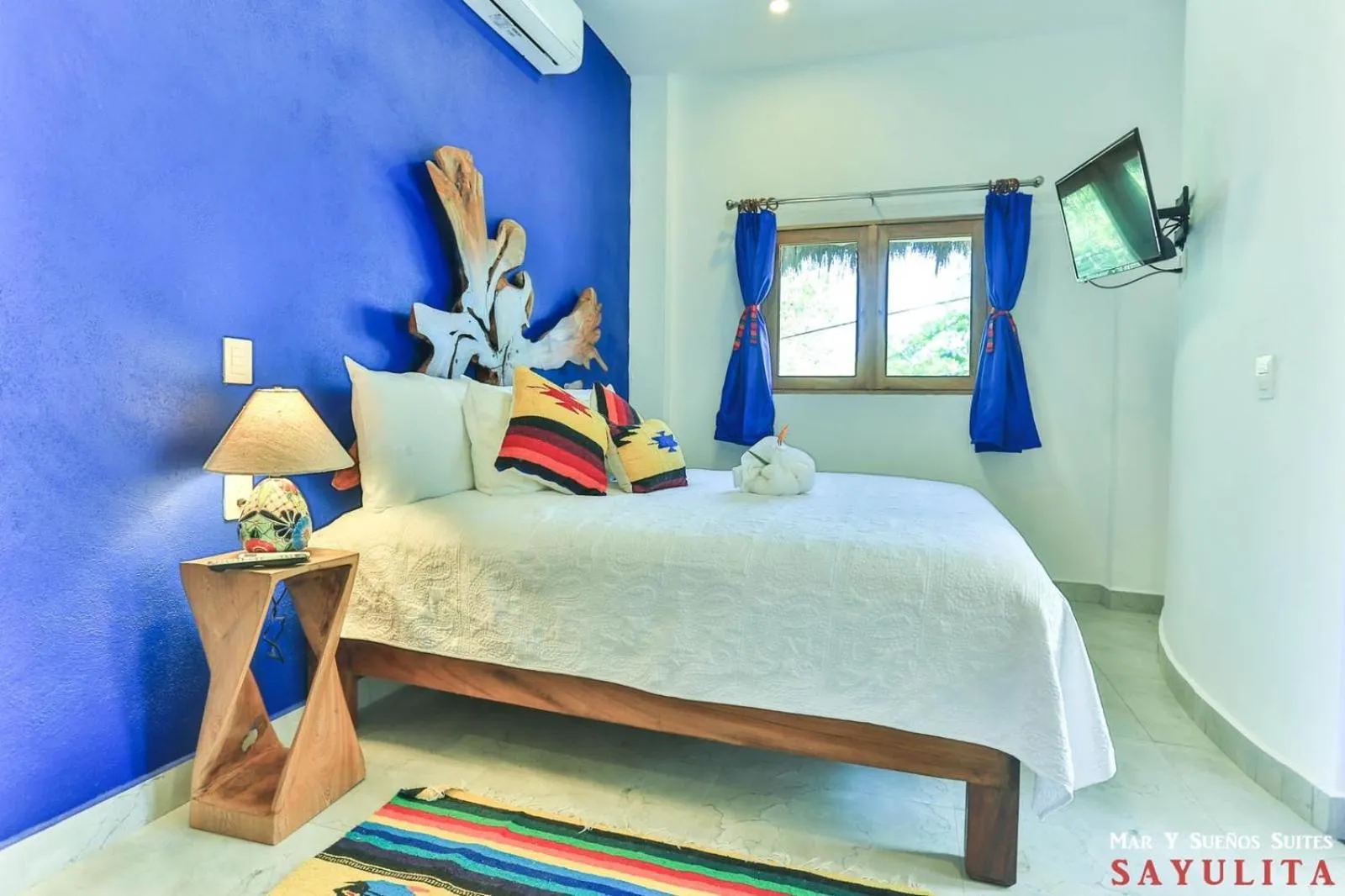 Bed in Mar y Sueños Suites