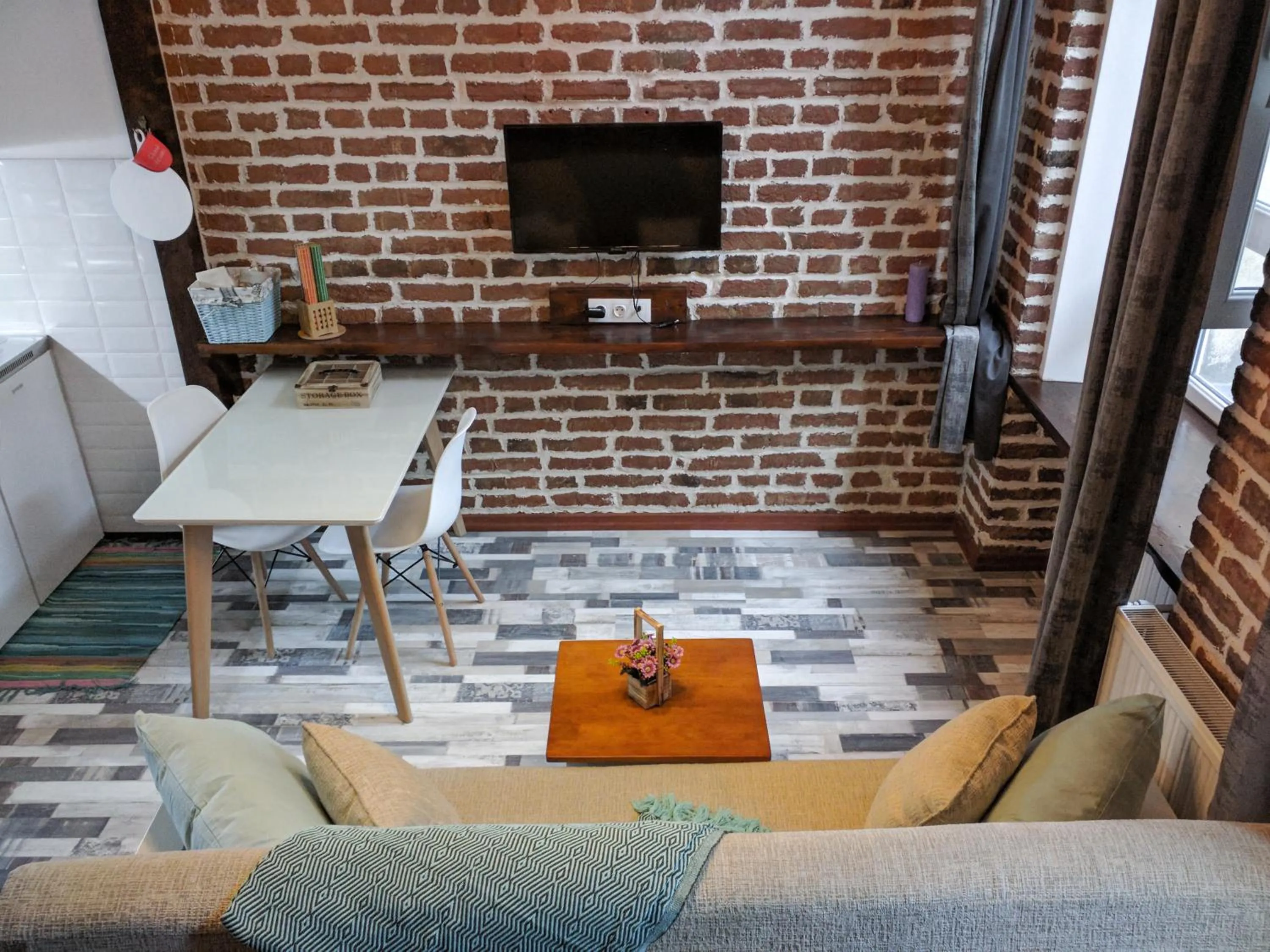 Living room in Cozy Studios on Freedom Square