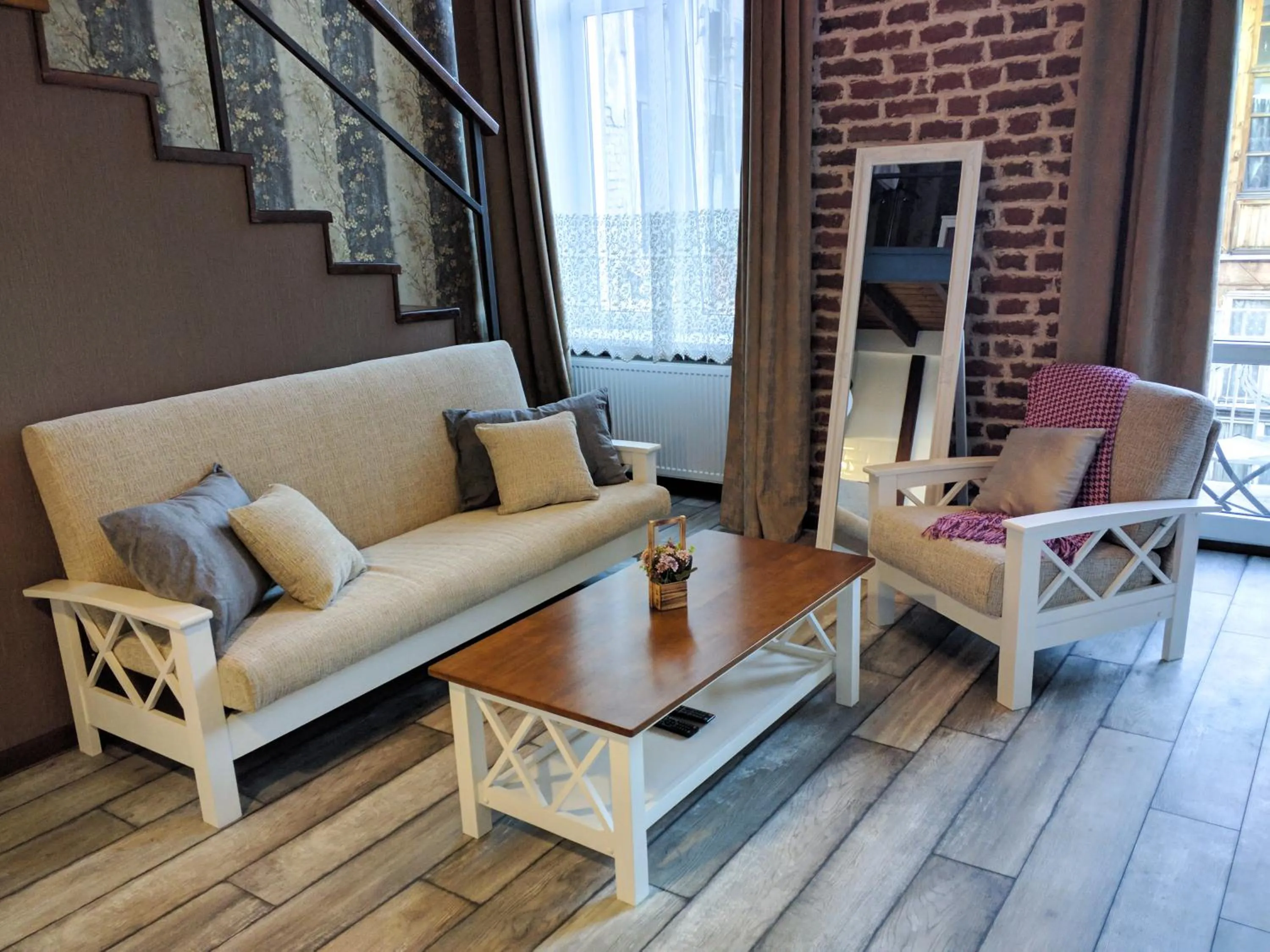 Living room in Cozy Studios on Freedom Square