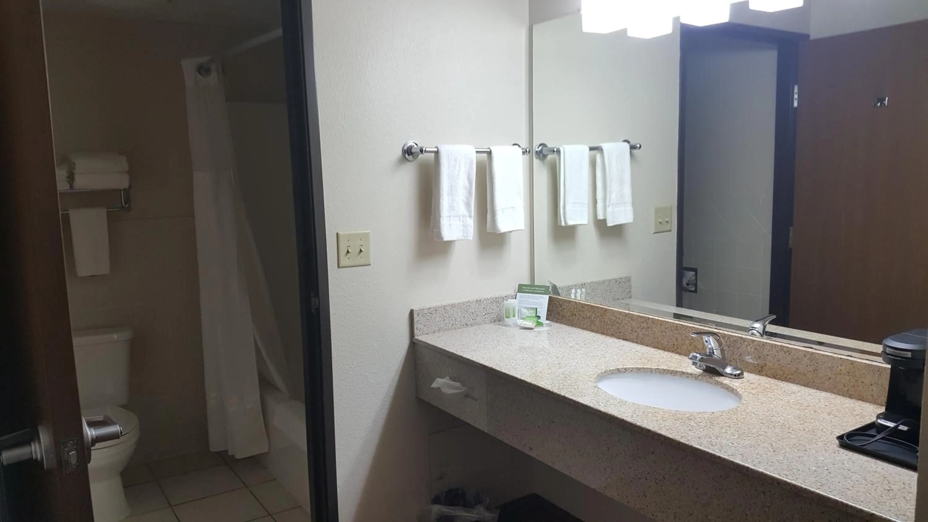 Bathroom in AmericInn by Wyndham Muscatine