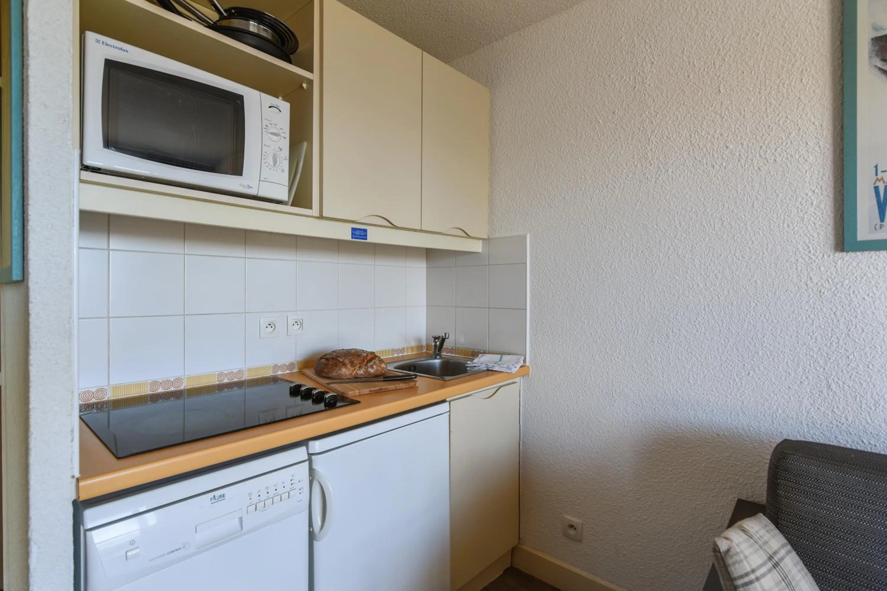 Kitchen or kitchenette in Résidence Pierre & Vacances Le Pédrou