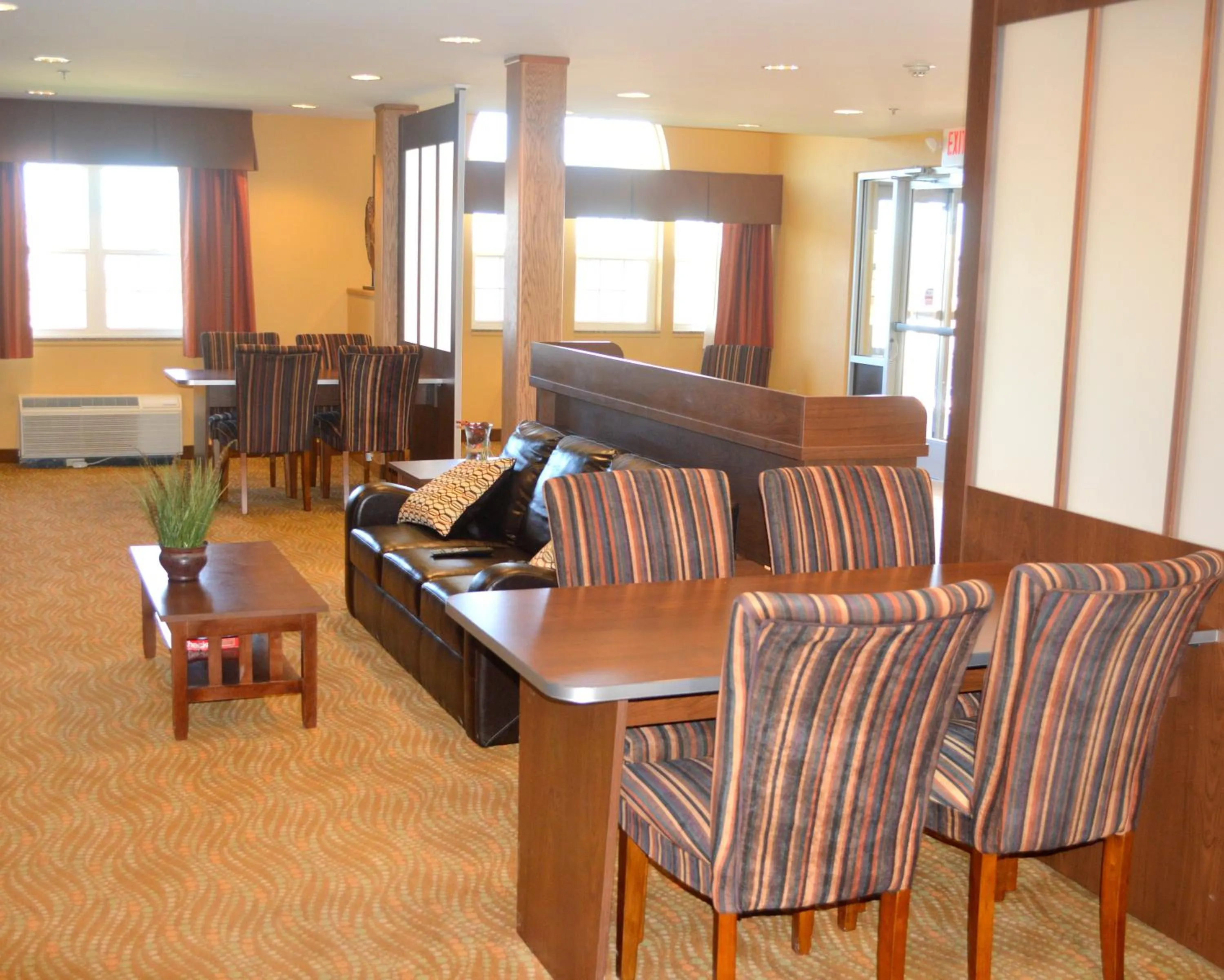 Communal lounge/ TV room in Microtel Inn and Suites by Wyndham Rawlins