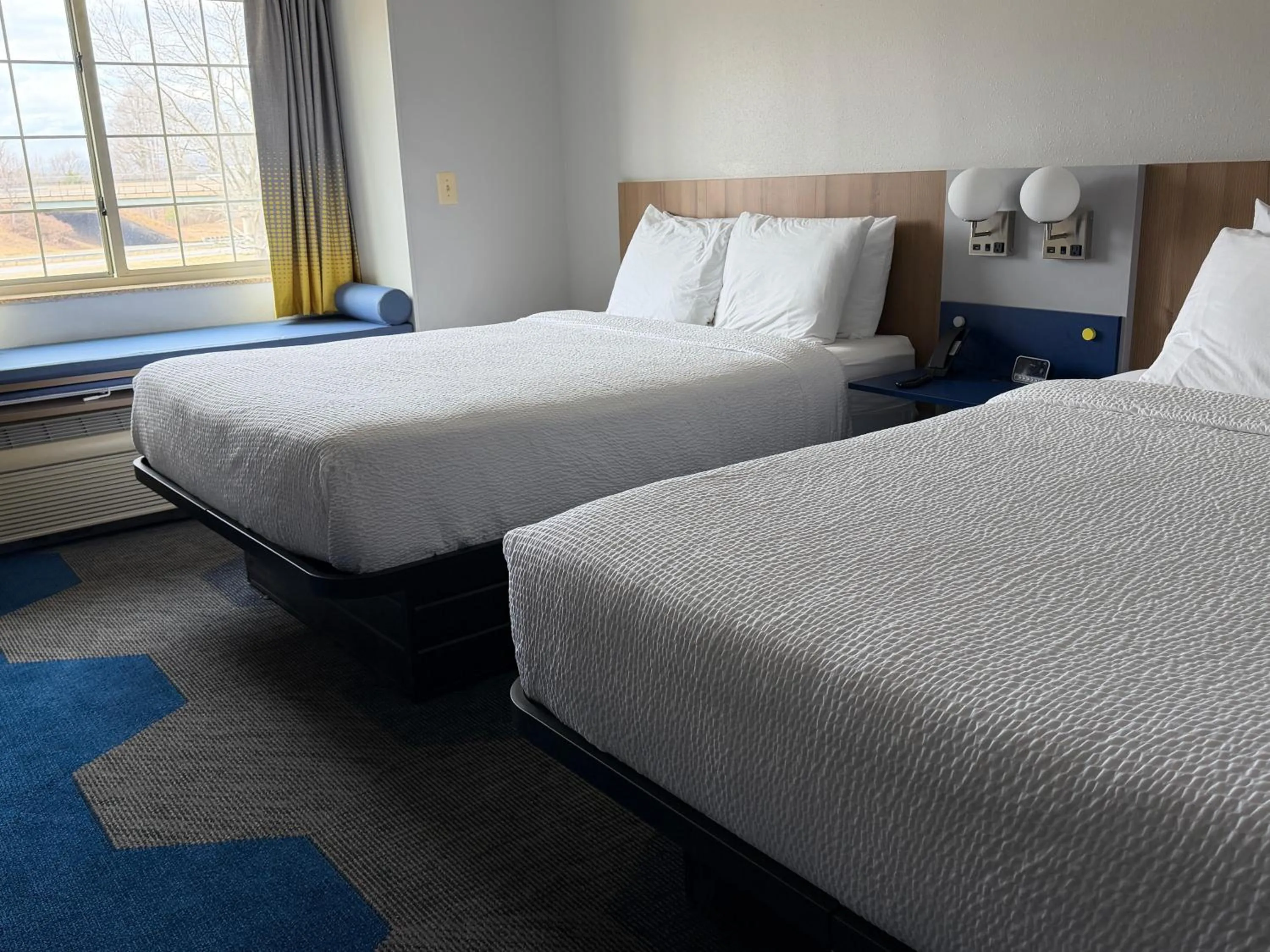 Bed in Microtel Inn & Suites by Wyndham Culpeper