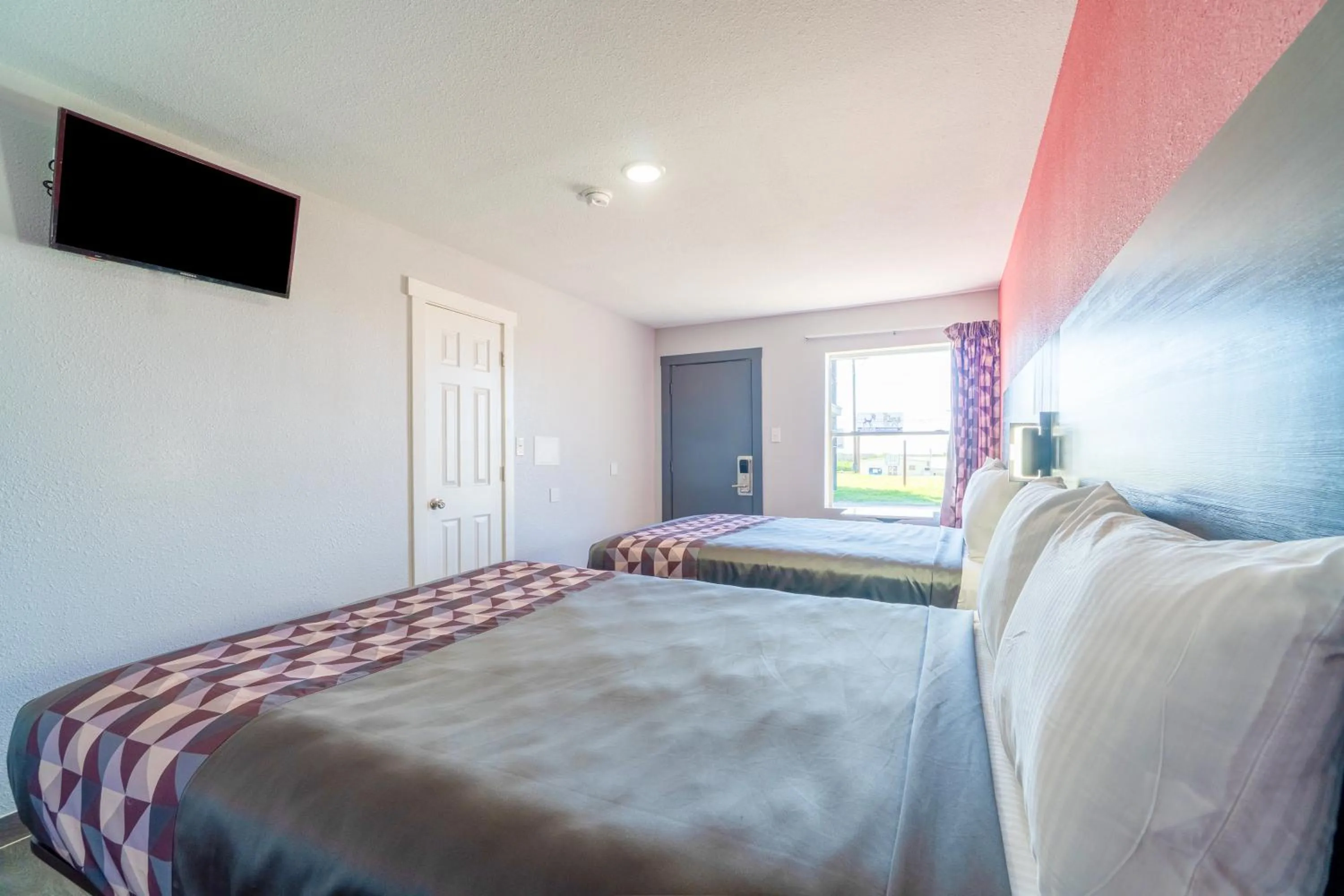 Bedroom in Royal Inn