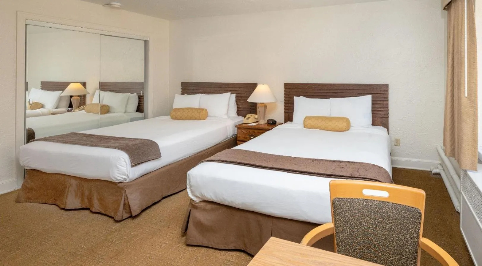 Bed in The Baroness Hotel