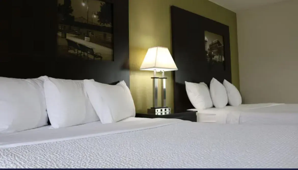 Deluxe Queen Room with Two Queen Beds - designated Pet Room - Non-Smoking in Super 8 by Wyndham Winona MN Deluxe Queen Room with Two Queen Beds - designated Pet Room - Non-Smoking in Super 8 by Wyndham Winona MN