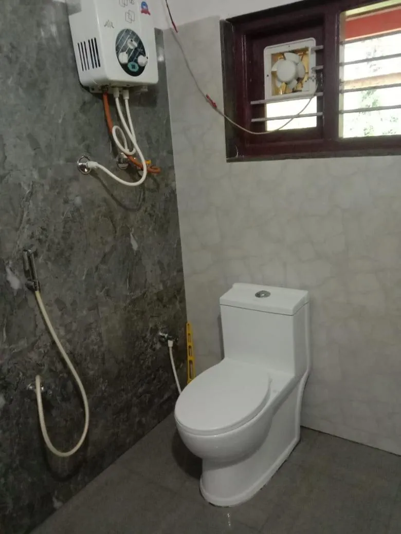 Bathroom in Leela Farm Stay - Exclusive for Group Stay