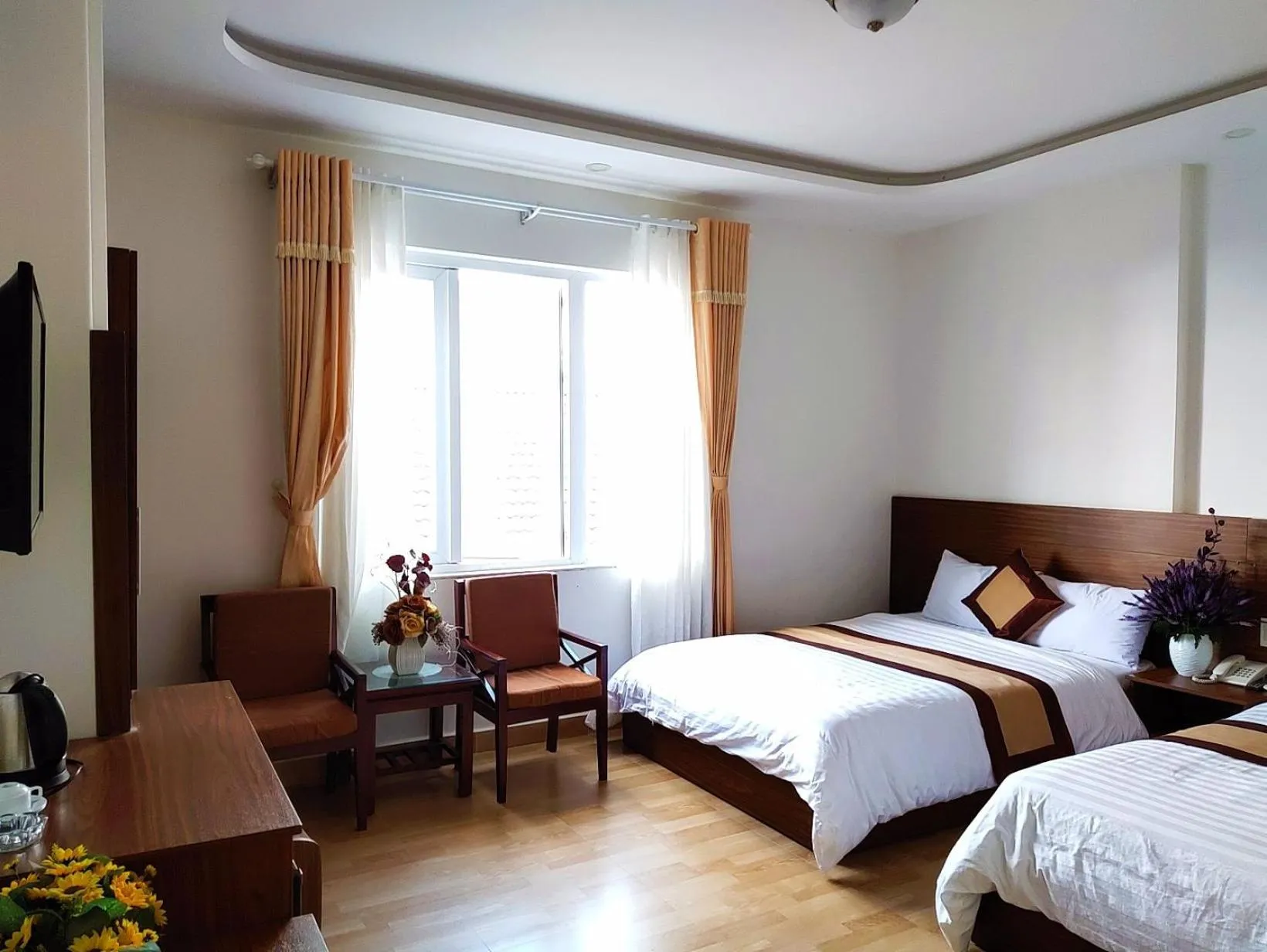 Photo of the whole room, Bed in New Hampton Suits-Tam Xuan Centre Hotel