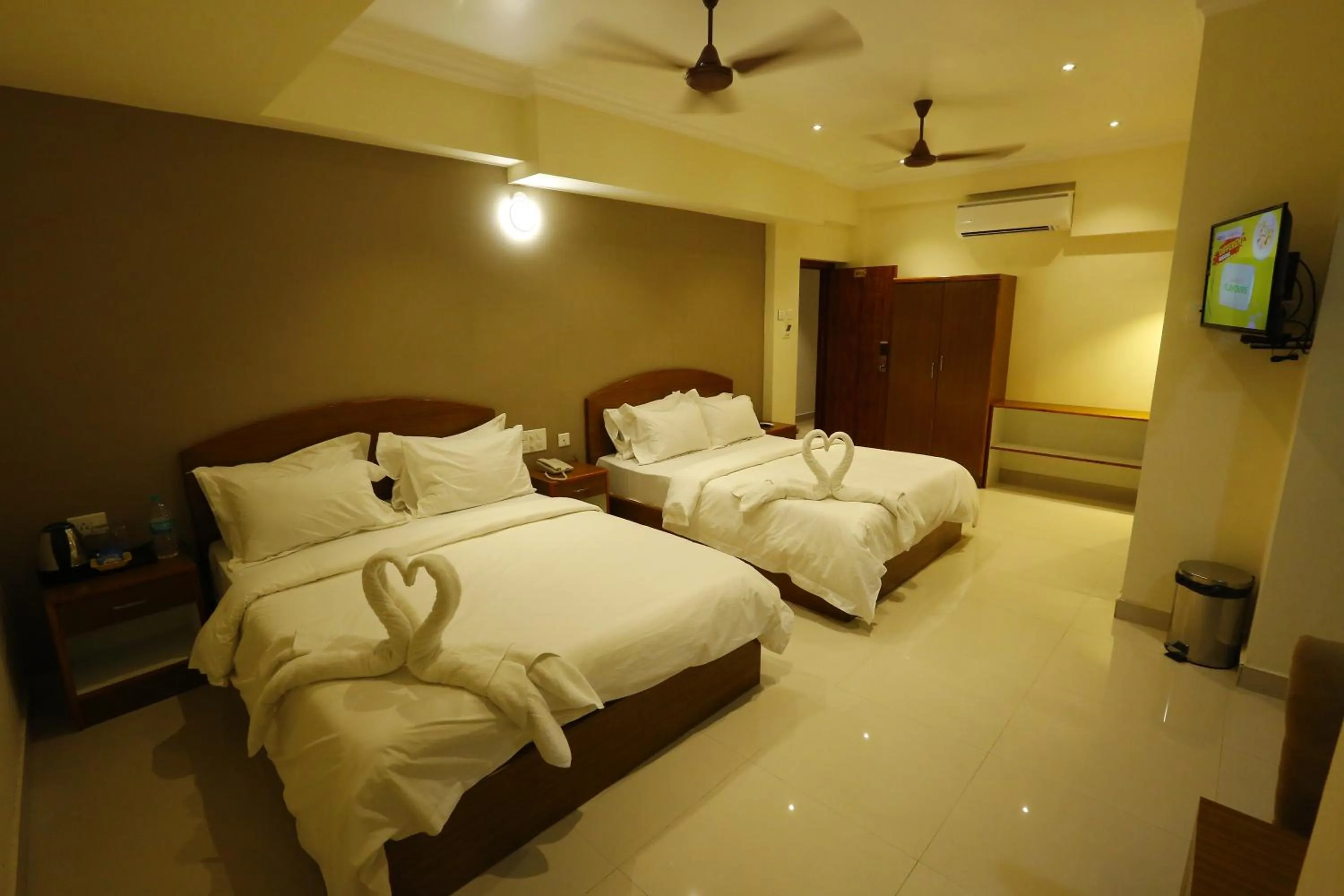 Photo of the whole room, Bed in Nitheesh Residency