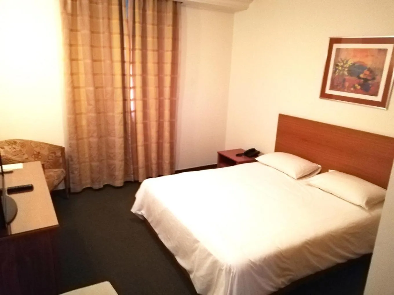 Bed in Brazilia Suites Hotel