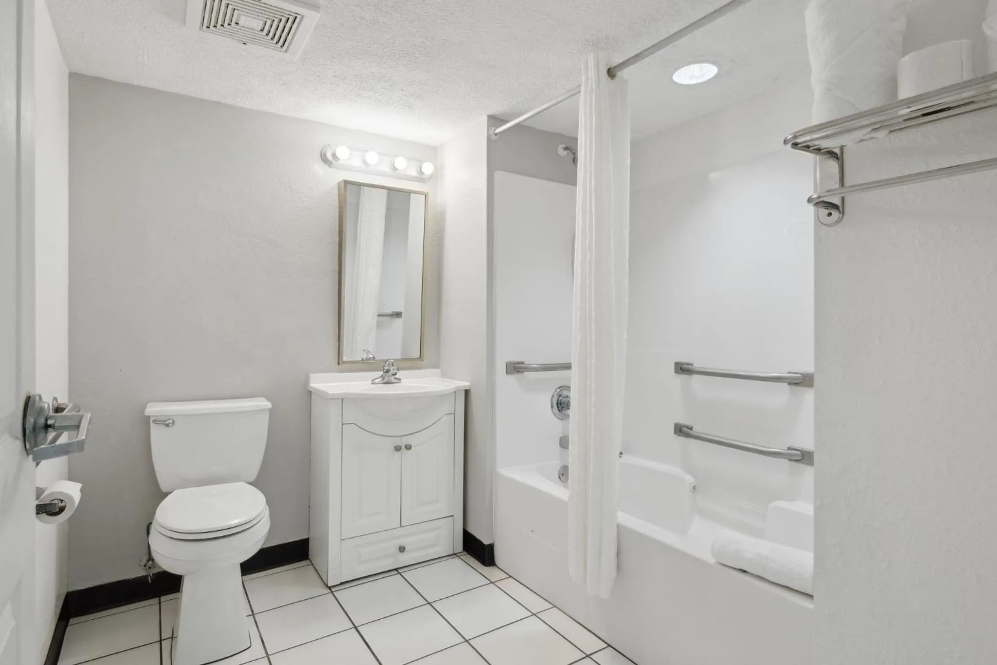 Bathroom in Holiday Terrace Beachfront Hotel, a By The Sea Resort