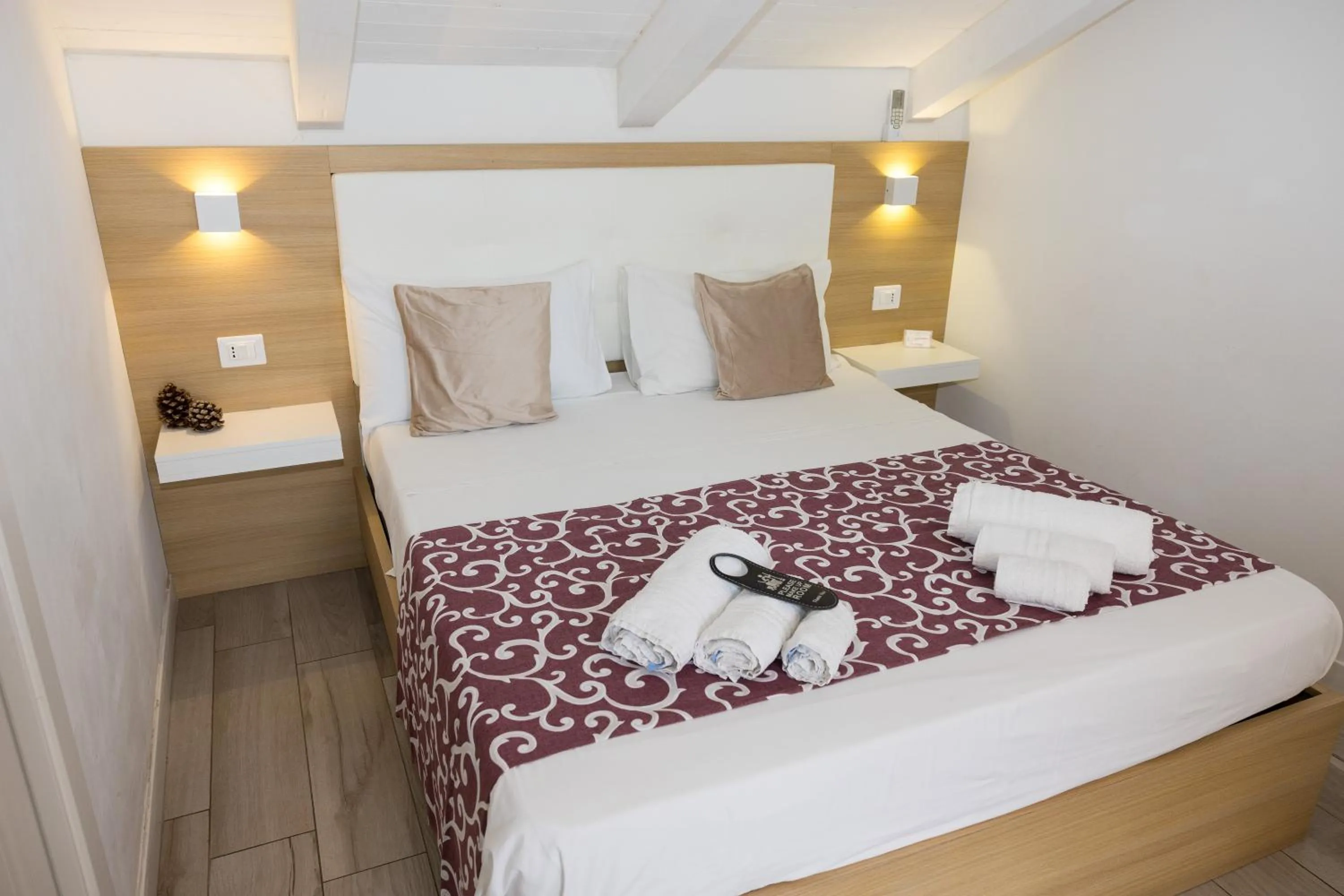 Bed in B&B Island Tropea -Sea View Rooms & Suites-