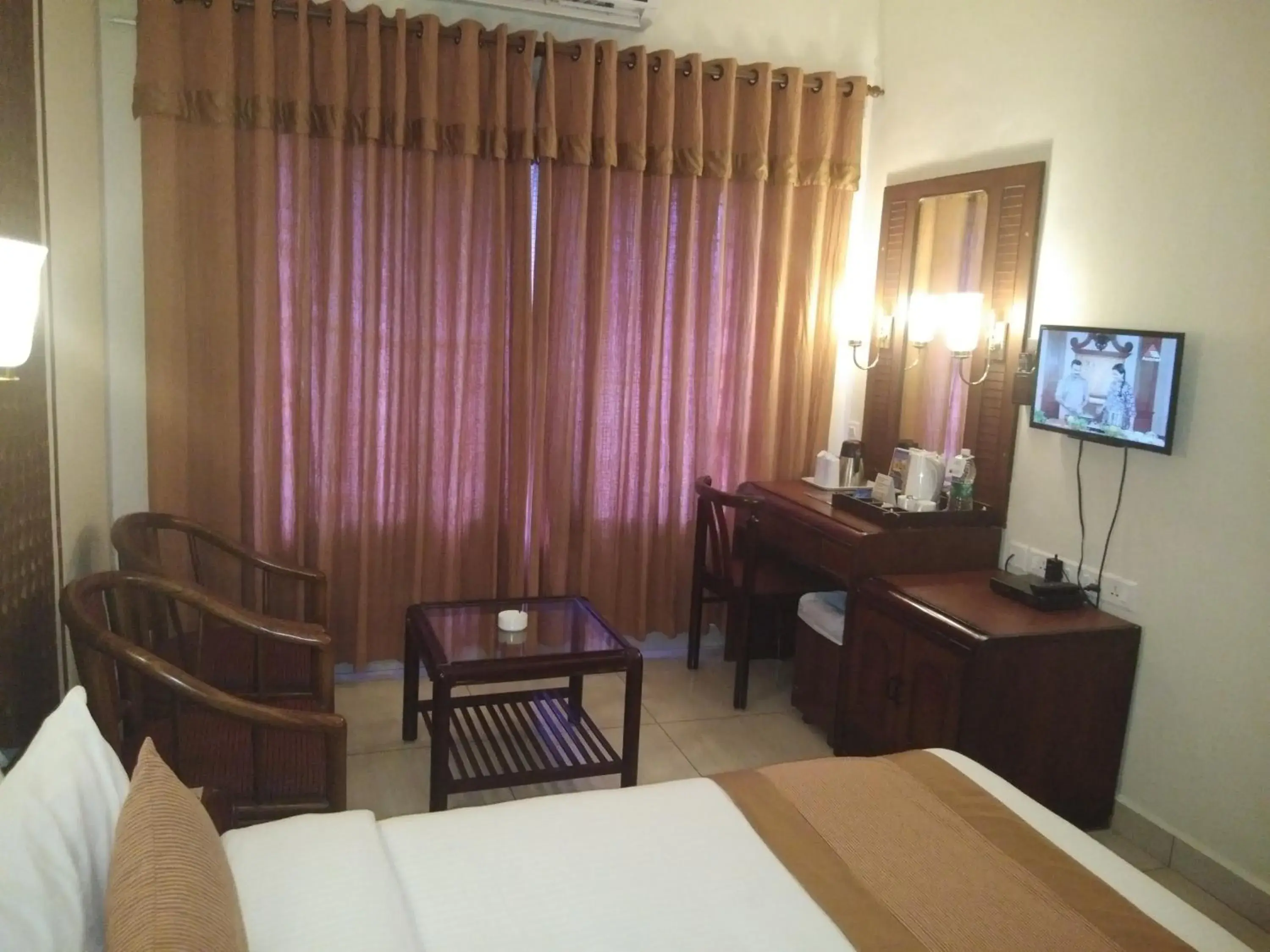 Seating area, Bed in Yuvarani Residency Seating area, Bed in Yuvarani Residency