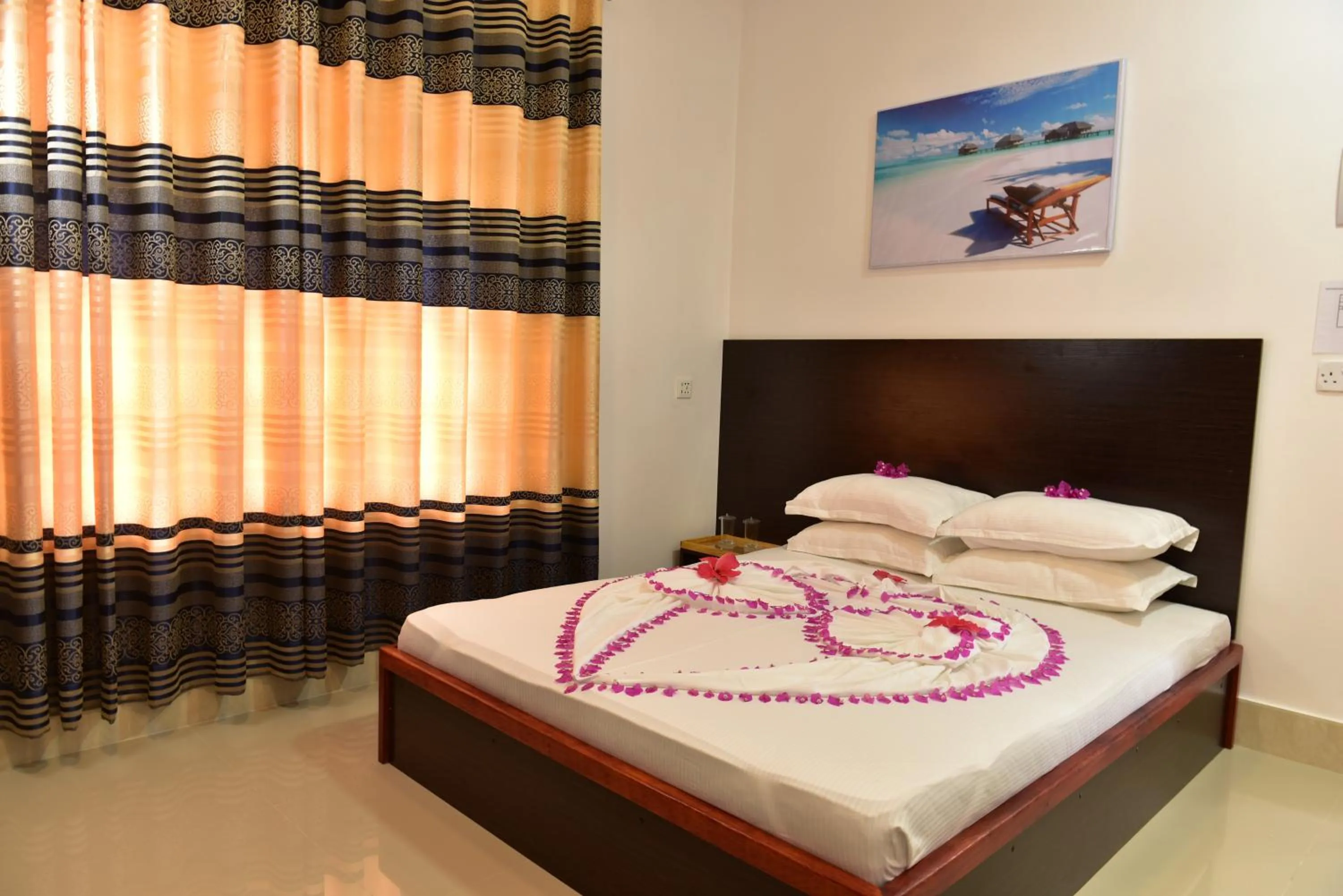 Bed in Moodhumaa Inn