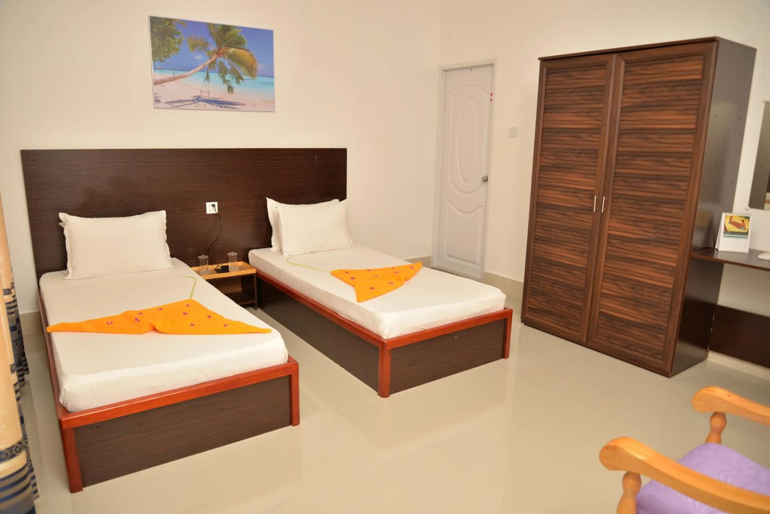 Bed in Moodhumaa Inn