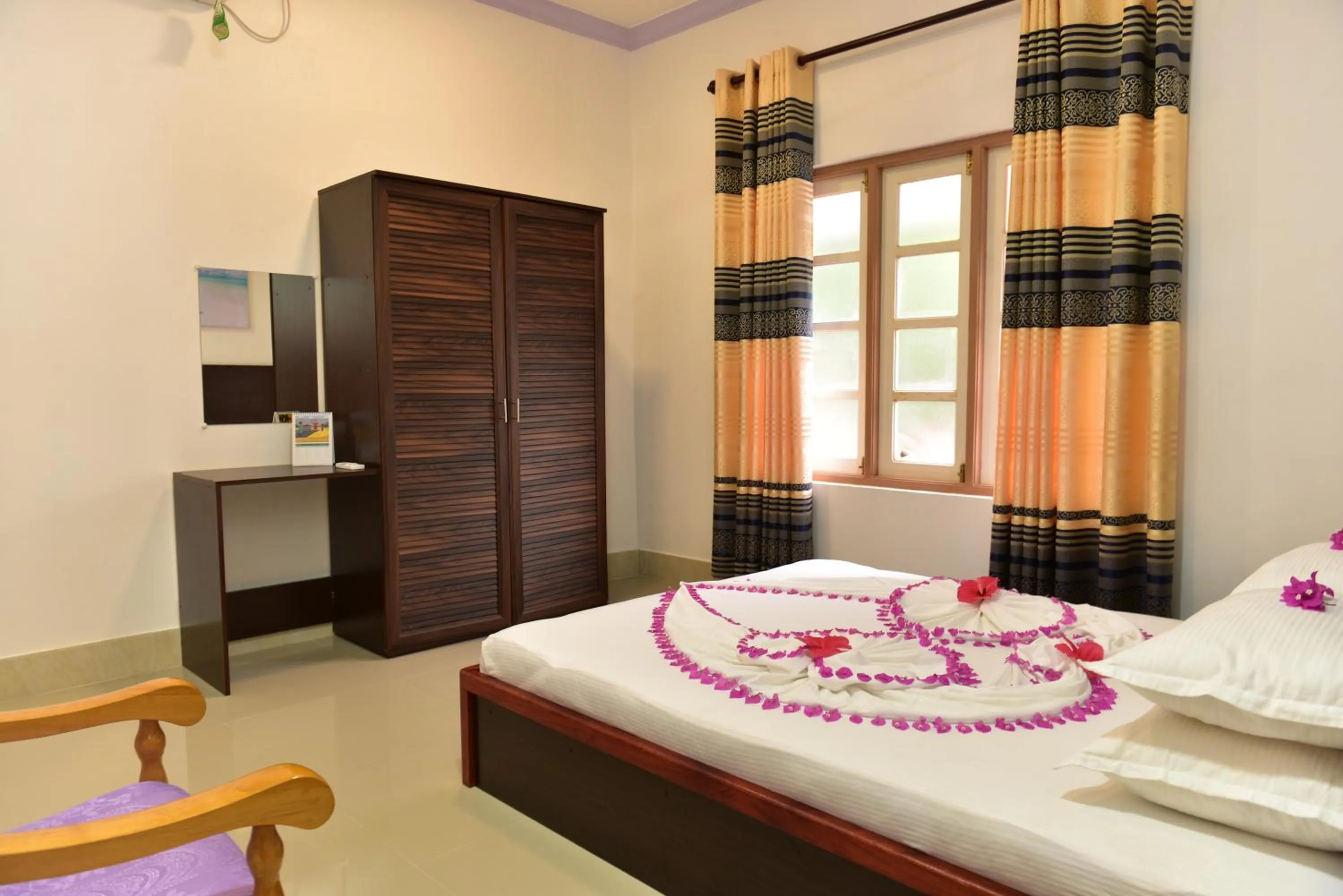 Bed in Moodhumaa Inn