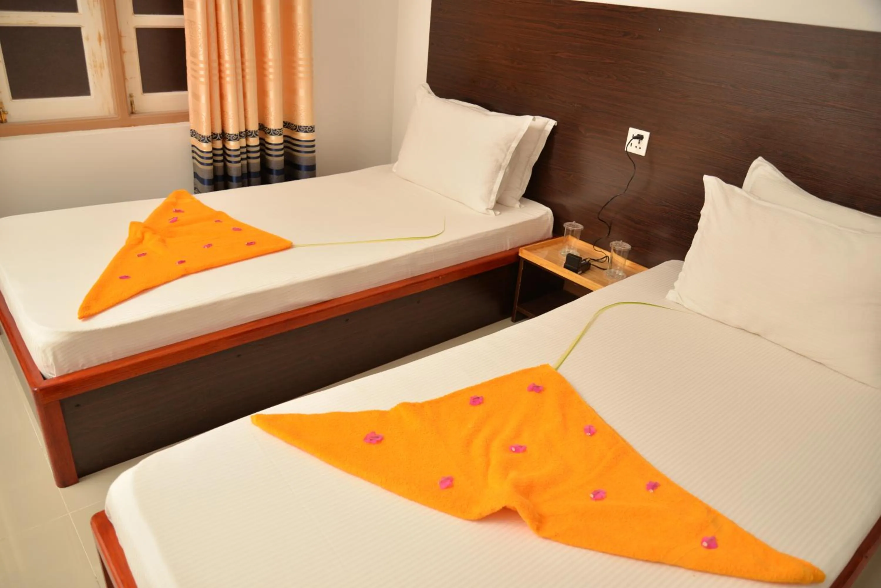 Bed in Moodhumaa Inn