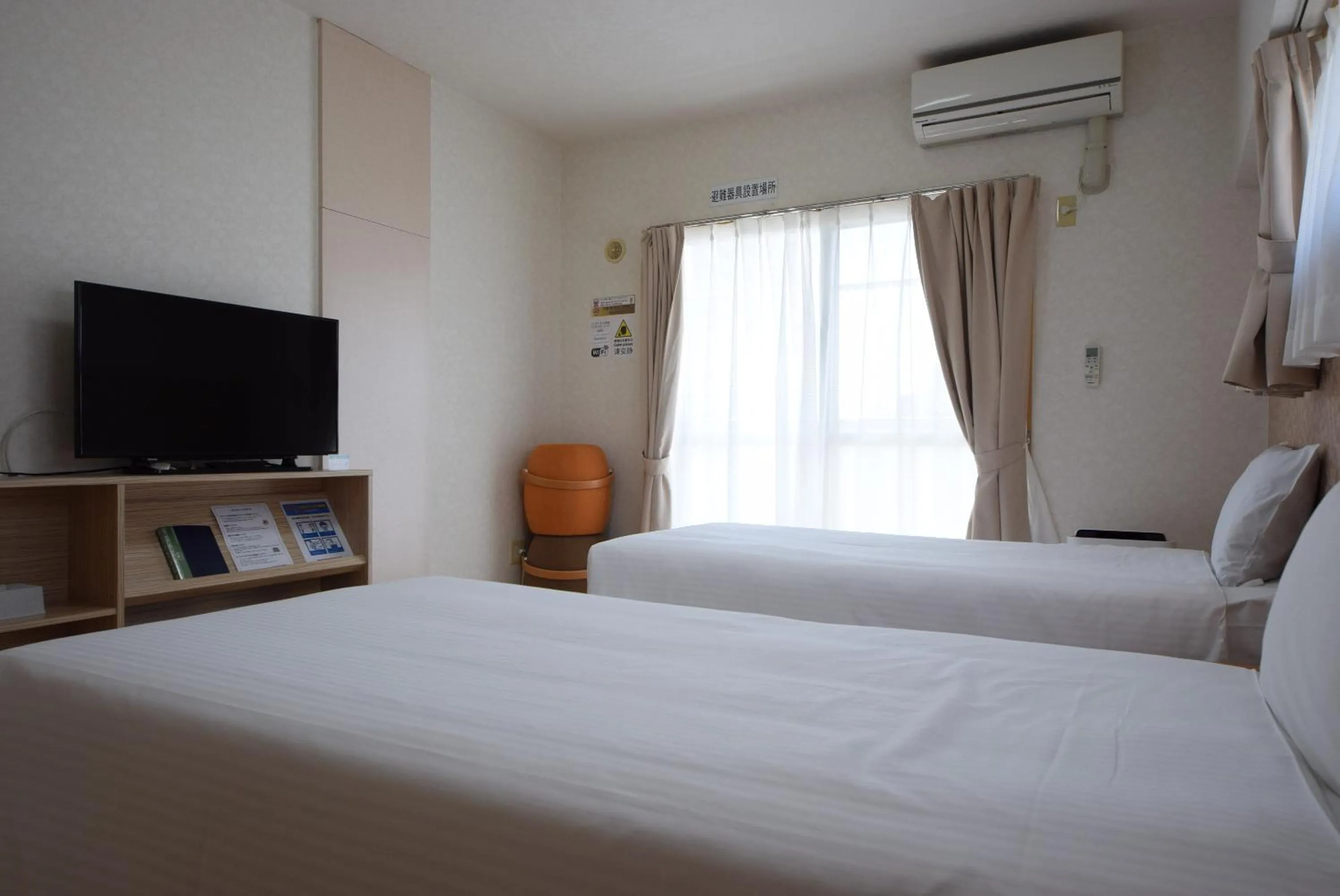 Photo of the whole room, TV/Entertainment Center in STAY IN SUMUKA Kokusai Street