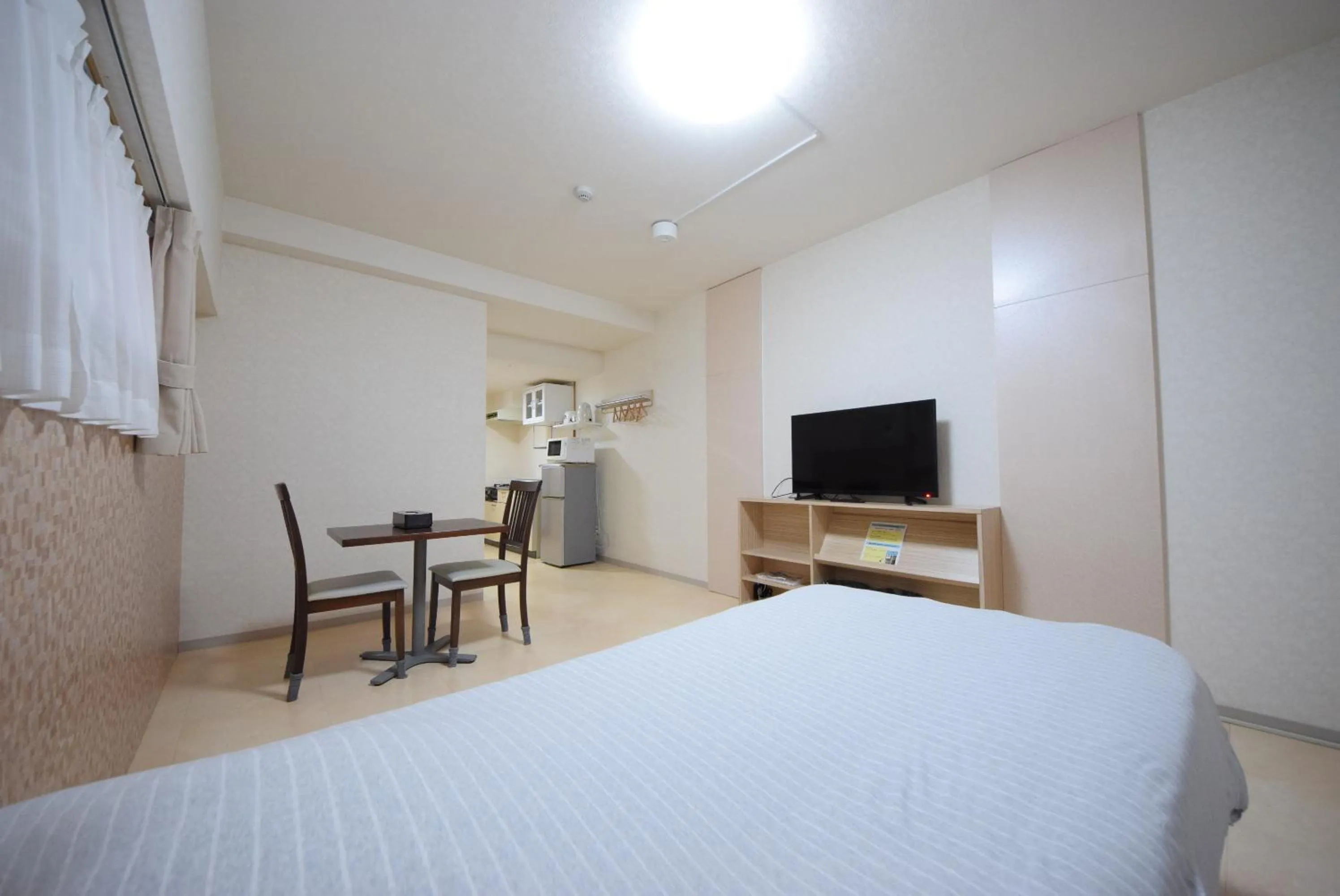 Photo of the whole room, TV/Entertainment Center in STAY IN SUMUKA Kokusai Street