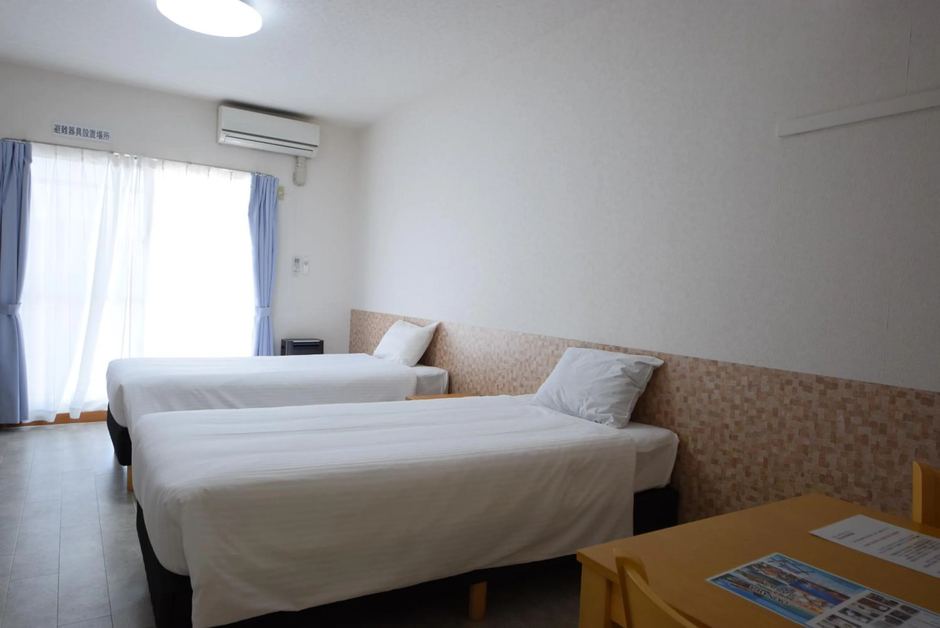 Bed in STAY IN SUMUKA Kokusai Street