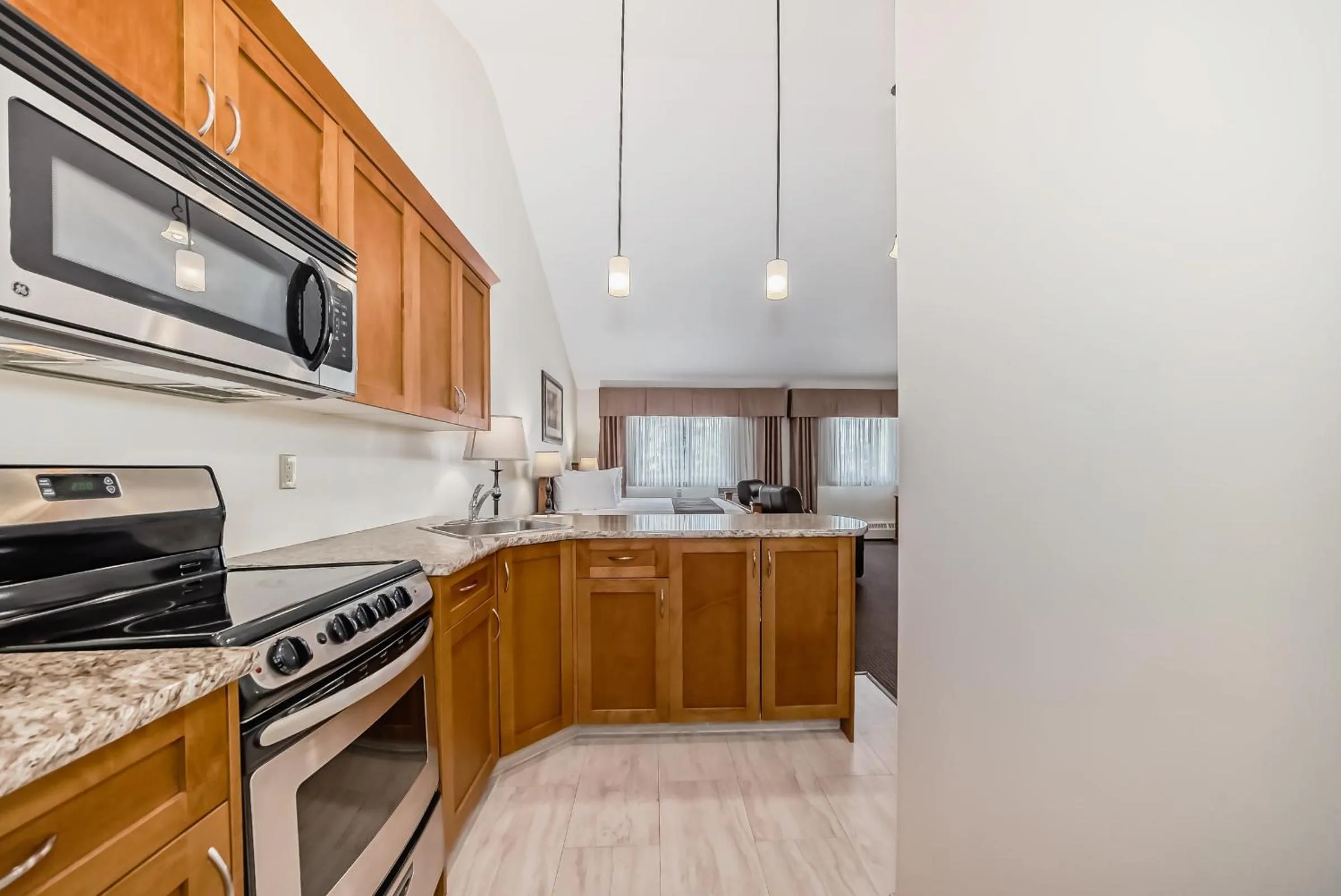 Kitchen or kitchenette in Stony Plain Inn & Suites
