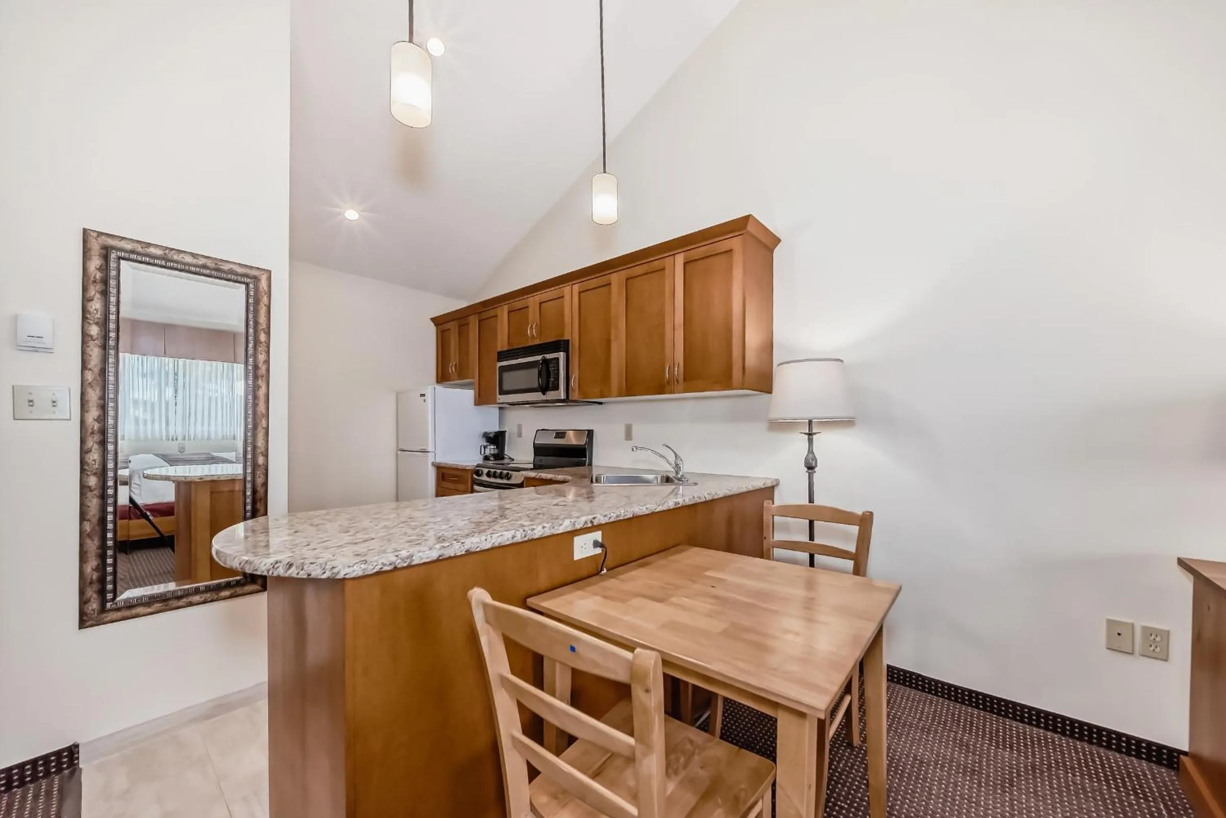Kitchen or kitchenette in Stony Plain Inn & Suites