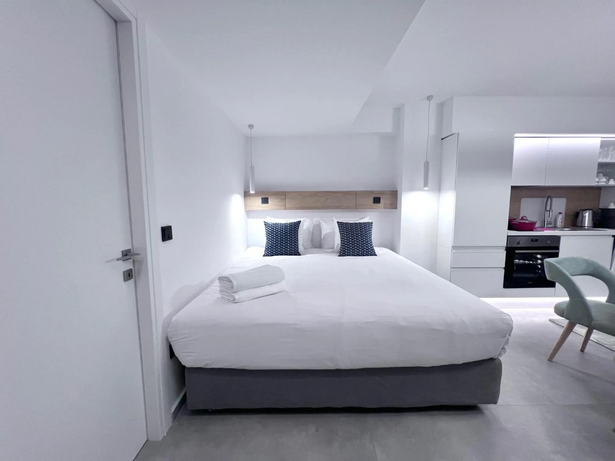 Bed in PINACOTA SUITES ATHENS