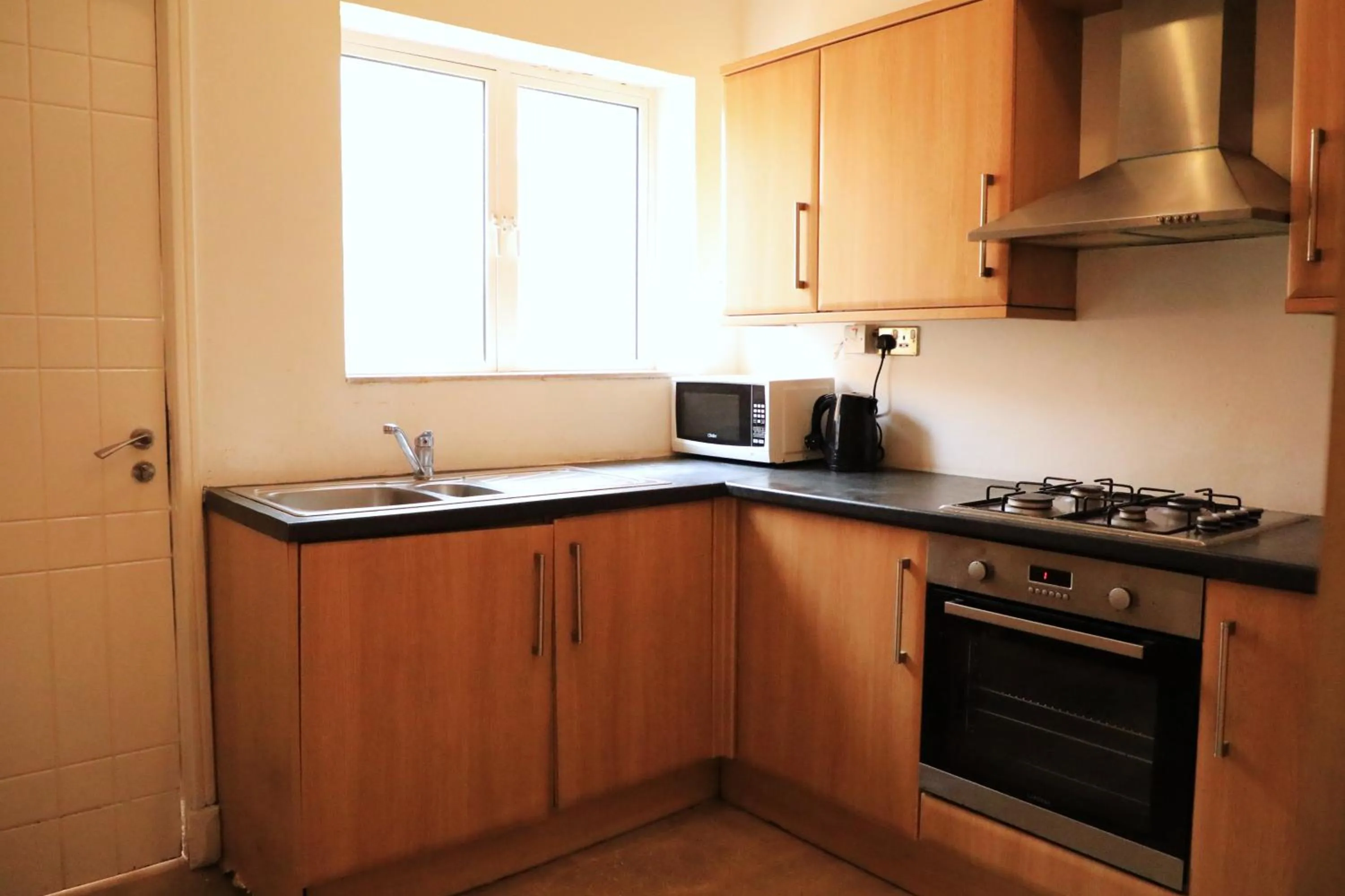 Kitchen or kitchenette in Star Emirates Garden Villas Salalah