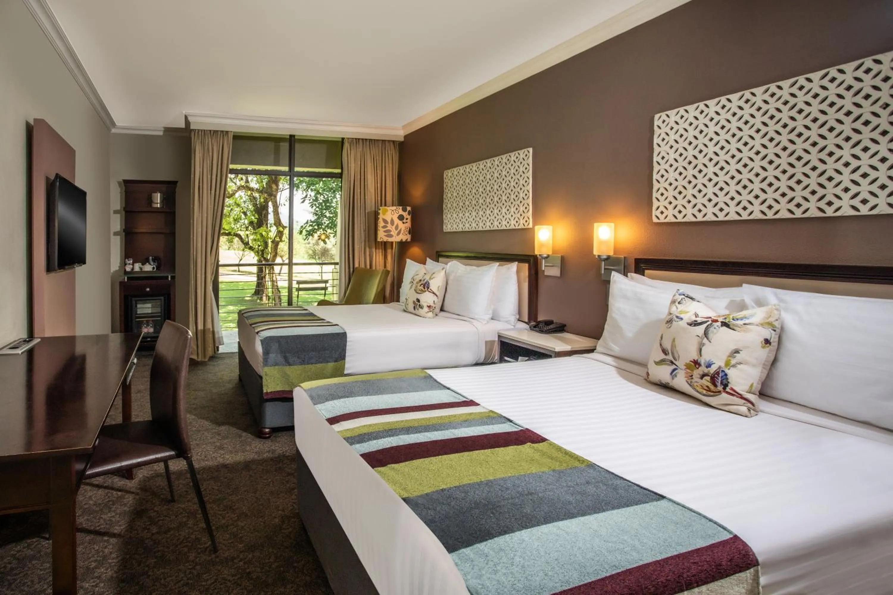 Bed in Sabi River Sun Resort