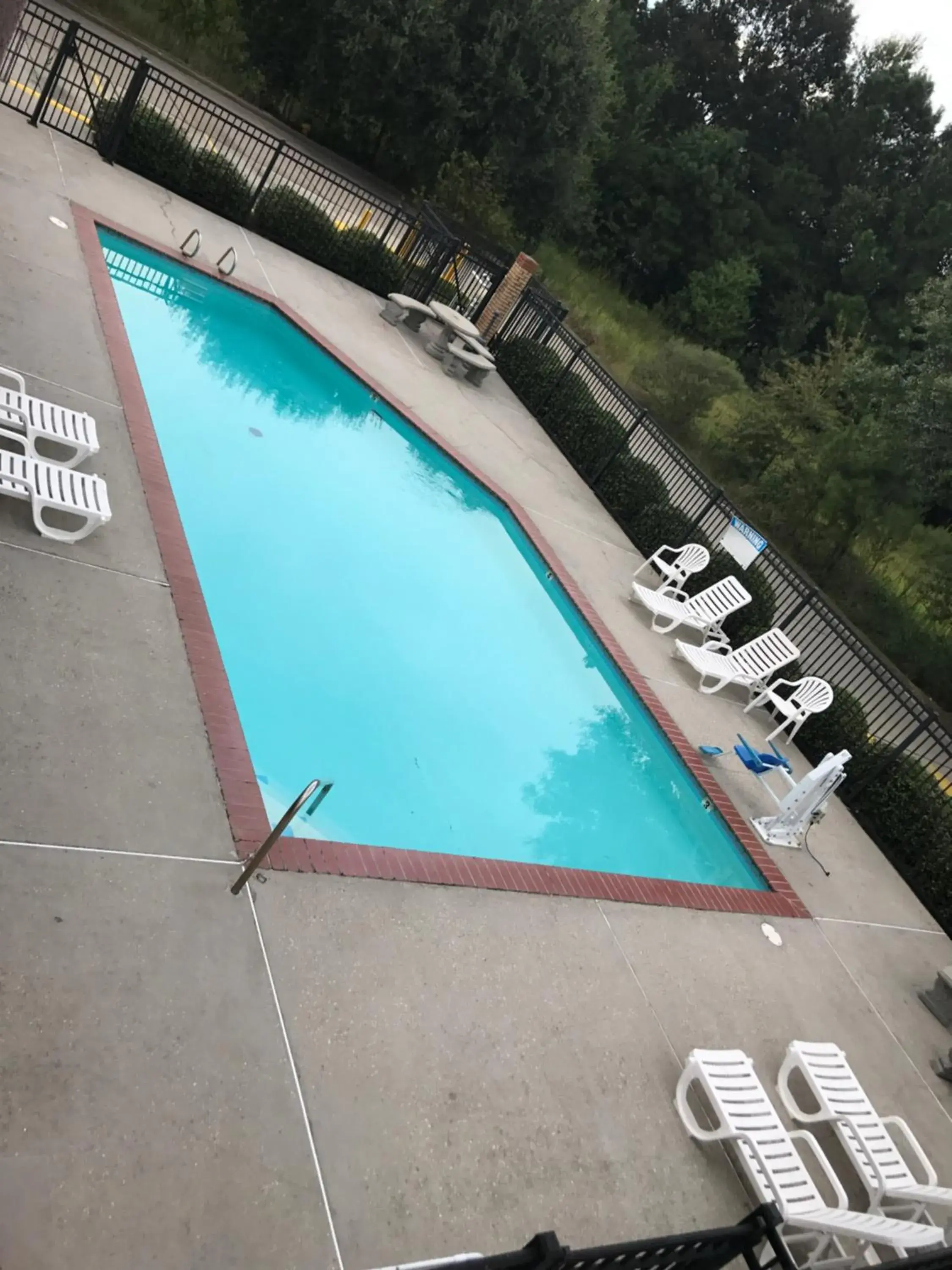 Swimming pool in Super 8 by Wyndham Slidell Swimming pool in Super 8 by Wyndham Slidell